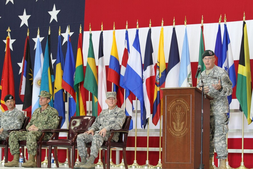 Army Brig. Gen. Sean P. Mulholland, the commander of U.S. Special Operations Command South (SOCSOUTH) addresses the audience after assuming command from Navy Rear Adm. Thomas L. Brown II, who served as the SOCSOUTH commander since September 2010. During his remarks, Mulholland thanked Brown for his advice and said he looks forward to working with nations across the Western Hemisphere. SOCSOUTH is responsible for all U.S. Special Operations activities in the Caribbean, Central and South America; it serves as a component to U.S. Southern Command. (Department of Defense Photo by Army Sgt. 1st Class Alex Licea, Special Operations Command South Public Affairs)