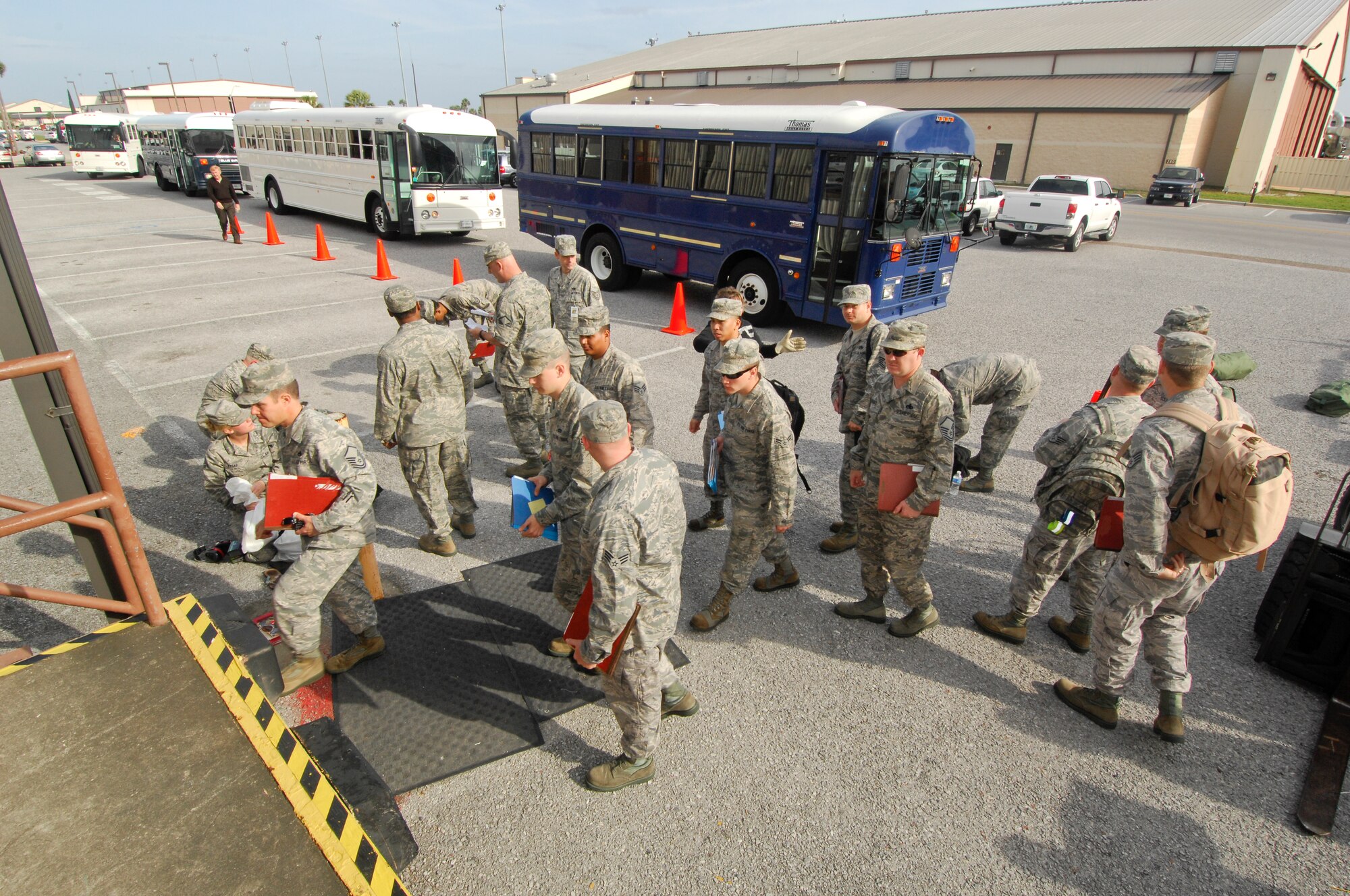 Airmen perform a mock deployment line during a base-wide exercise in May. Exercises provide opportunities to validate training effectiveness and provides opportunities to make changes where needed with minimal risk to personnel and property. Tyndall will continue to hold a minimum of one exercise per quarter and scenarios will vary. (U.S. Air Force photo by Lisa Norman)