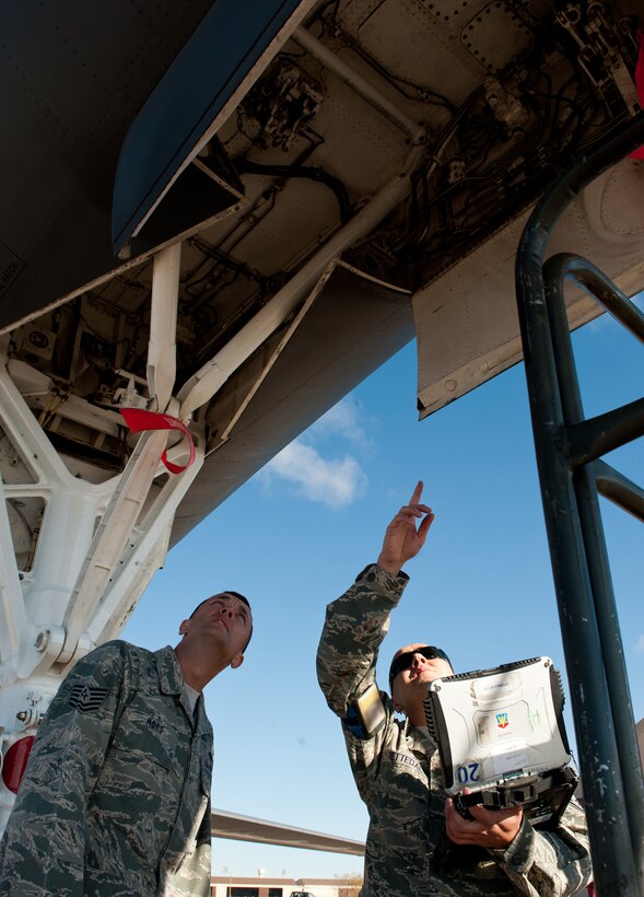 Tech. Sgt. Jeremy Hord, 8th Air Force aircraft maintenance manager (left), evaluates Staff Sgt. Daniel Rettedal, 28th Aircraft Maintenance Squadron B-1 dedicated crew chief, during a preflight inspection of a B-1 during Global Strike Challenge at Ellsworth Air Force Base, S.D., Oct. 1, 2012. The goal of Global Strike Challenge is to showcase the world’s premier bomber and intercontinental ballistic missile forces, foster esprit de corps through competition and teamwork, recognize outstanding personnel, and improve the Air Force’s combat capabilities. (U.S. Air Force photo by Airman 1st Class Kate Thornton-Maurer/Released)