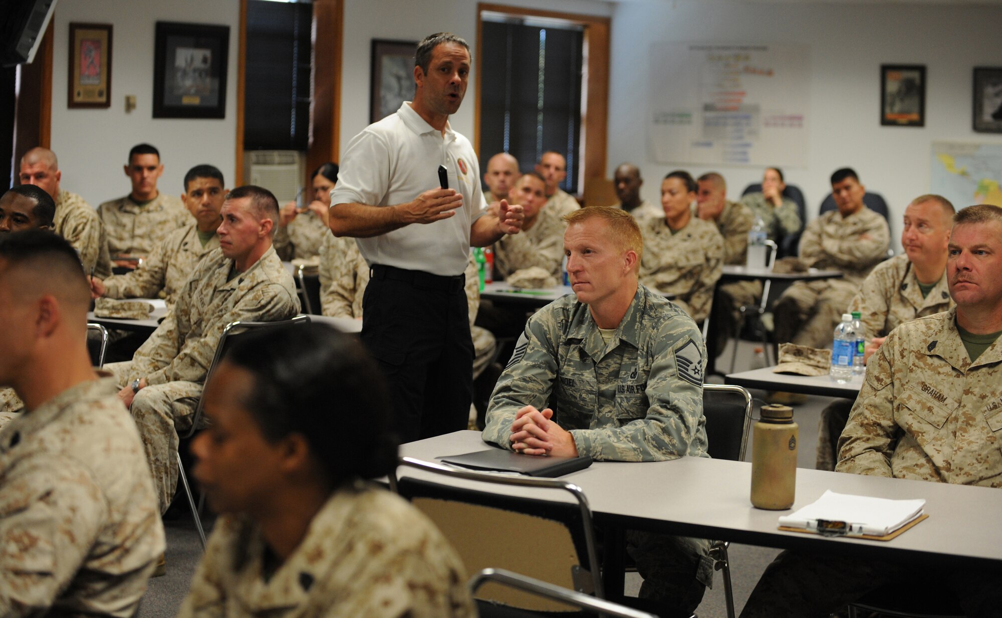 Air Force Master Sgt. Michael Noel attends class with Marines and one international student during the U.S. Marine Corps Staff Noncommissioned Officer Academy Advanced Course at Marine Corps Base Quantico, Va., Sept. 14, 2012. Noel is attending Senior Enlisted Professional Military Education as part of a new program called EPME-Next. Noel is the Secretary of the Air Force Public Affairs superintendent of force management at the Pentagon. (U.S. Air Force photo/Senior Airman Christina Brownlow)