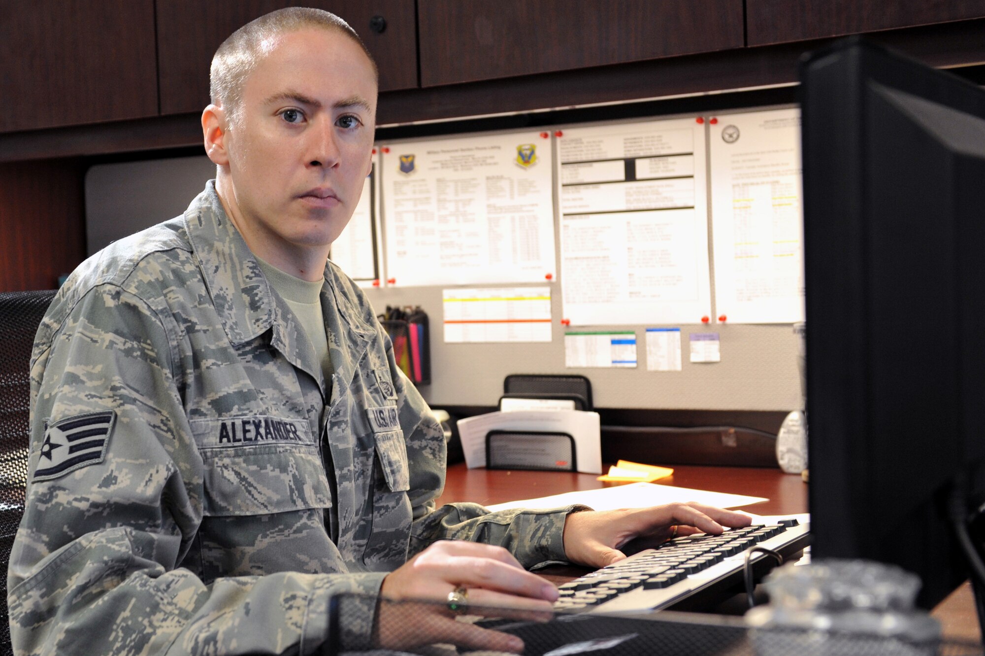 WHITEMAN AIR FORCE BASE, Mo. -- Staff Sgt. Matthew Alexander, 509th Force Support Squadron NCO in charge of reenlistments, returned July 2 following a five months deployment to the 386th Air Expeditionary Wing as a Rest and Recuperation Liaison Officer for Allied Forces Central Europe. (U.S. Air Force photo/Heidi Hunt) (Released) 