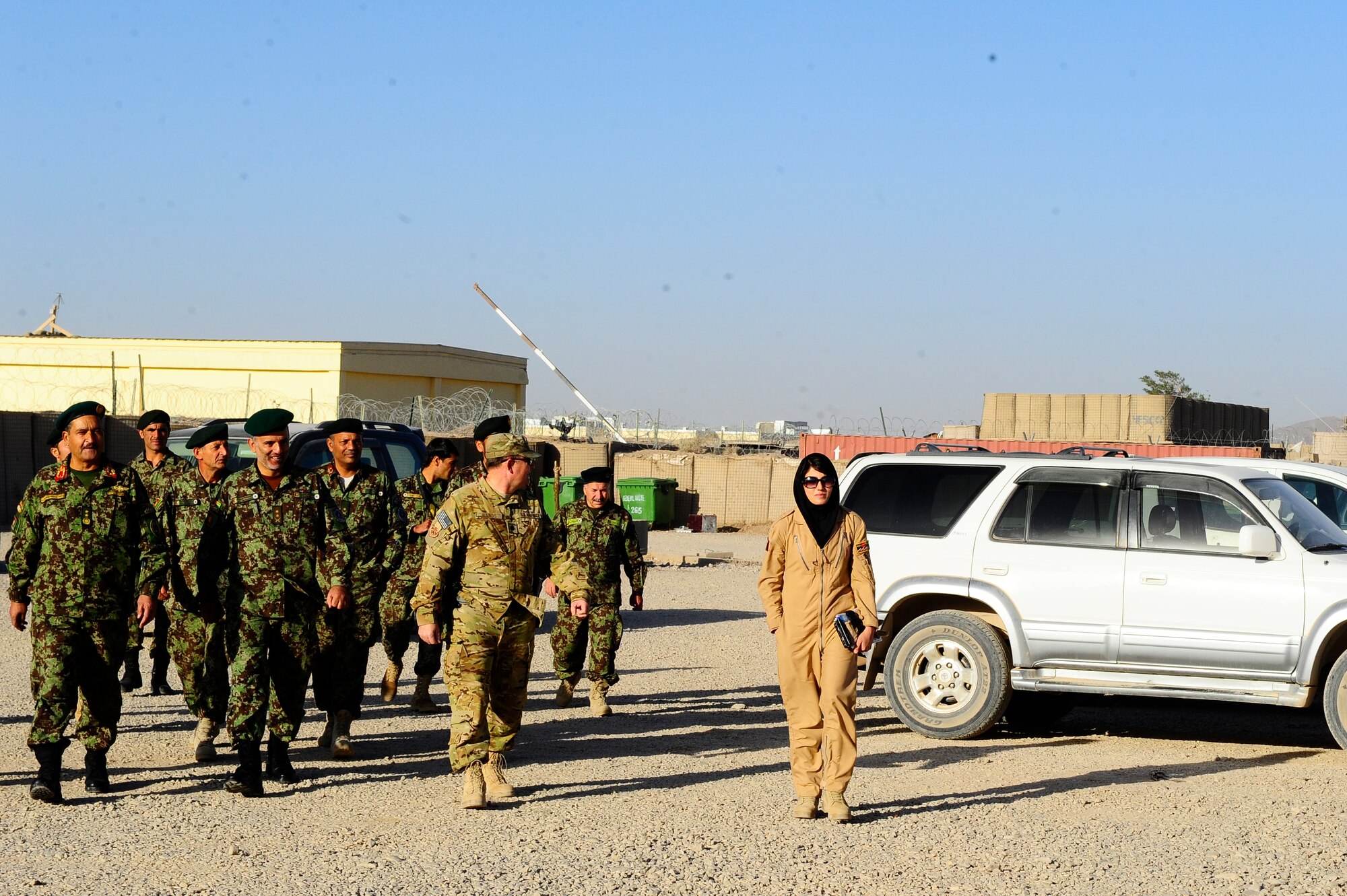 Having completed her first solo flight in a Cesna-182, Afghan Air Force Lt. Nilofor Rhamani prepares to be thrown in a dunk tank – a U.S. AF tradition -- Sept. 30, 2012 at Shindand Air Base, Afghanistan. Rhamani is part of the second class of fixed-wing undergraduate pilot training students to attend formal training at Shindand Air Base under NATO Training Mission-Afghanistan.(U.S. Air Force photo by Staff Sgt. Melissa K. Mekpongsatorn)





