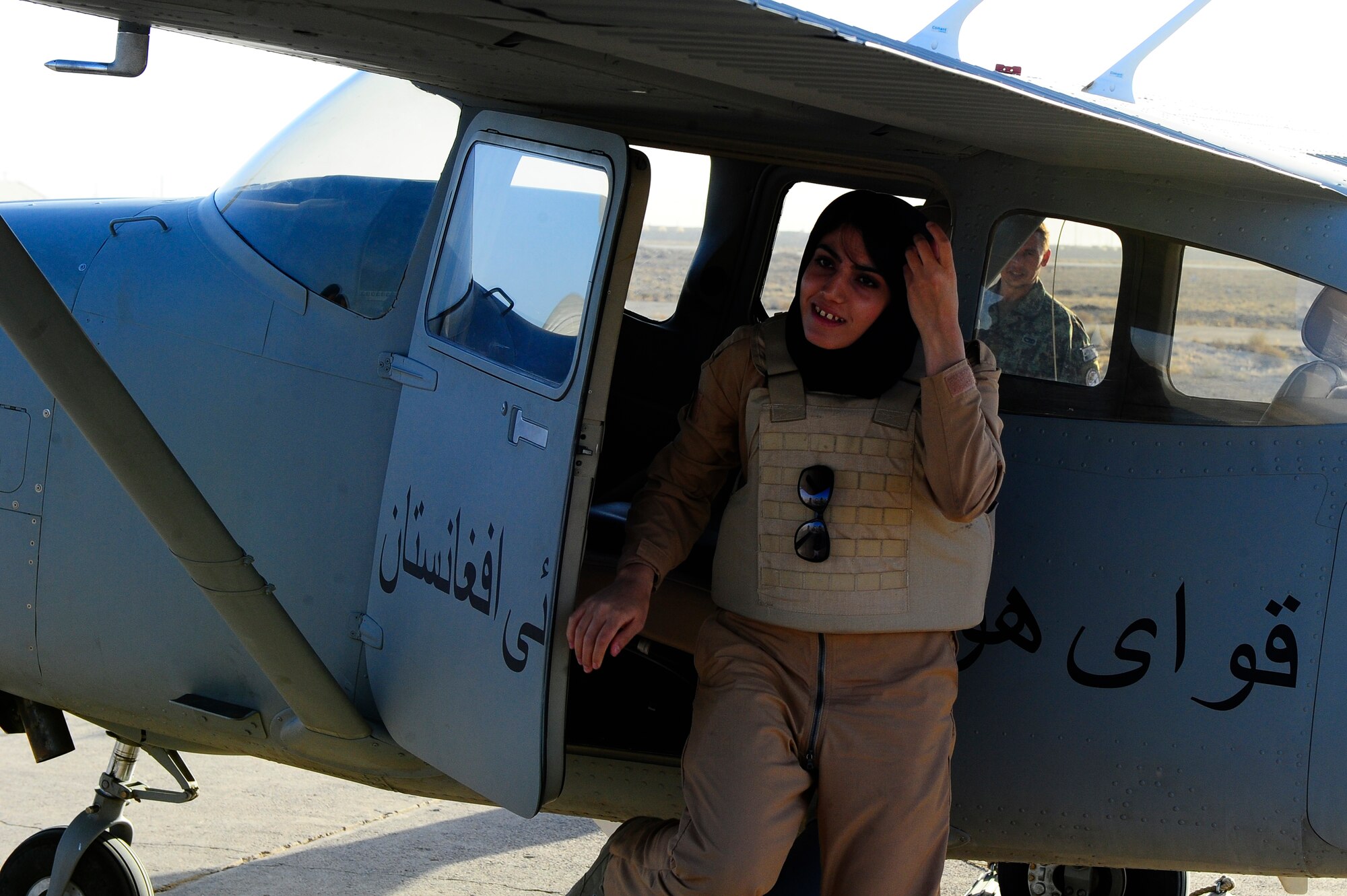 Afghan Air Force Lt. Nilofor Rhamani exits a Cesna-182 after successfully completing her first solo flight Sept.30, 2012 at Shindand Air Base, Afghanistan. Rhamani is the first female Afghan pilot to conduct all of her pilot training in Afghanistan.(U.S. Air Force photo by Staff Sgt. Melissa K. Mekpongsatorn)

