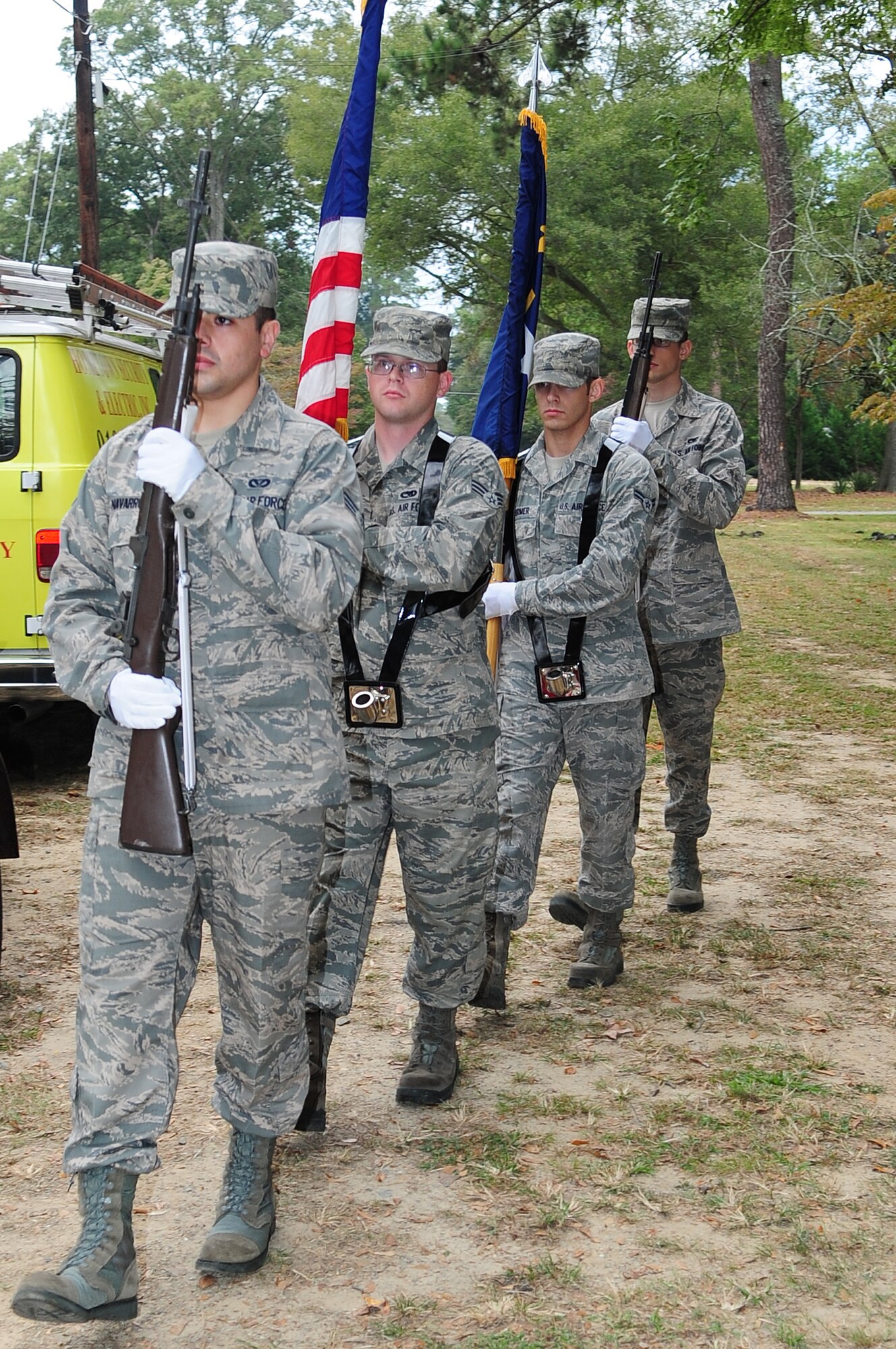 U.S. Air Force Airmen assigned to the 4th Fighter Wing Honor Guard present the colors at the 4th Annual Wife Appreciation Run in Goldsboro, N.C., Sept. 29, 2012. The presentation of the colors and the singing of the National Anthem kicked off the event. (U.S. Air Force photo/Airman 1st Class Aubrey Robinson/Released)
