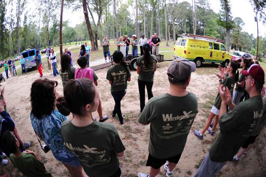 City of Goldsboro leaders speak at the 4th Annual Wife Appreciation Run in Goldsboro, N.C., Sept. 29, 2012. The mayor of Goldsboro, Al King, representatives from the Wayne County Sheriff’s Department, members of Team Seymour and more than 100 Goldsboro citizens attended the event, which supported the war on domestic violence. (U.S. Air Force photo/Airman 1st Class Aubrey Robinson/Released)
