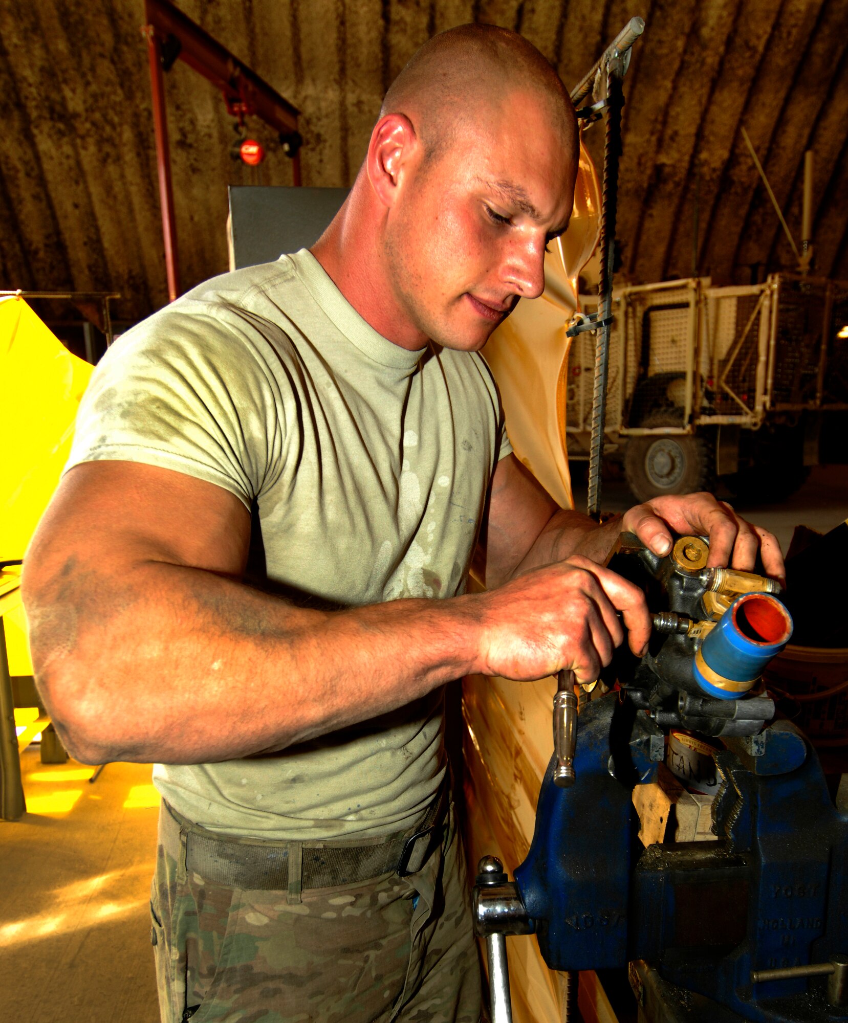 SrA Walter Holder, a 455th Expeditionary Logistics Readiness Squadron Vehicle Maintenance Journeyman, replaces O-rings on a water pump for a 455th Expeditionary Security Forces Squadron Mine Resistant Ambush Protected All-Terrain Vehicle at Bagram Air Field, Afghanistan, Oct. 3, 2012. The 455th ELRS tactical vehicle maintenance team works seven days a week, keeping pace with a steady flow of mundane vehicle repairs as well as critical upgrades which further enhance the safety of Bagram’s tactical vehicle fleet. (U.S. Air Force Photo/Staff Sgt. Jeff Nevison)