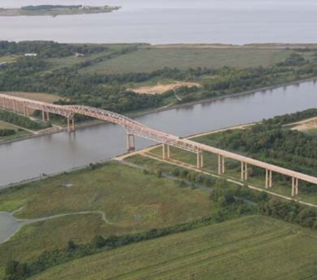 The U.S. Army Corps of Engineers Philadelphia District repairs Reedy Point Bridge at the Chesapeake & Delaware Canal while accomodating scheduling needs of nearby Delaware City, DE. 