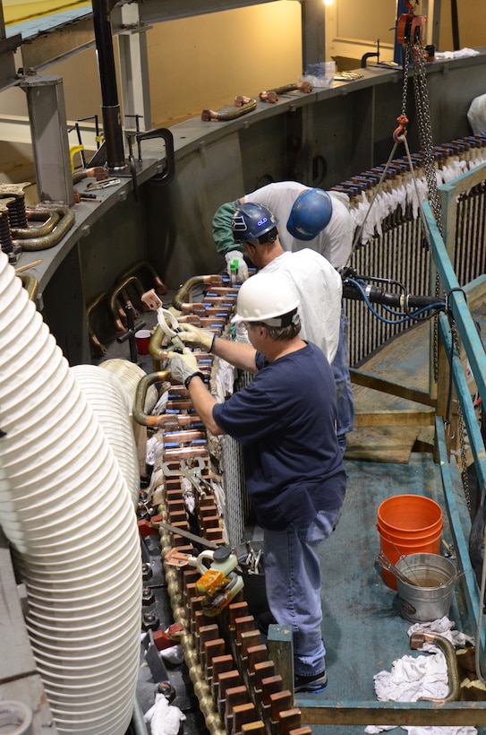 Contractors work on hydropower gerator unit Number 3 on Oct. 2, 2012. 