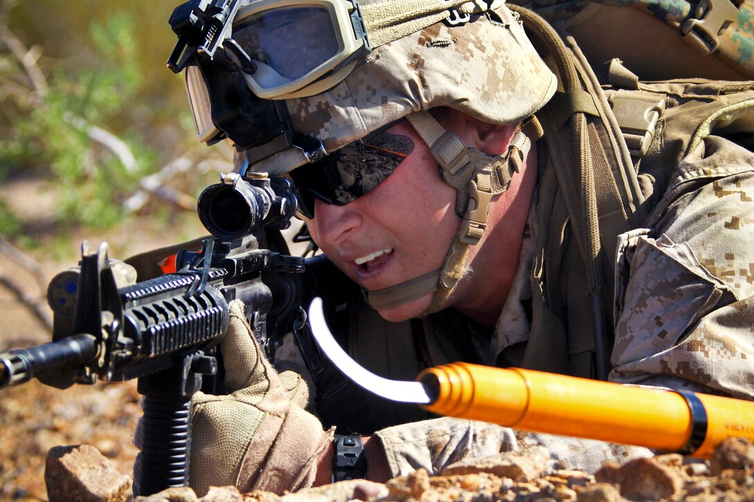 U. S. Marine Lance Cpl. Matthew McNeill provides security while