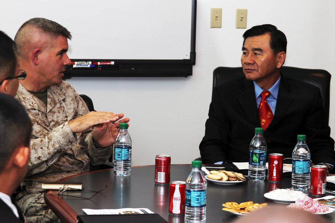 Major Gen. Joseph L. Osterman, commanding general, Marine Corps Recruiting Command, discusses the Marines' recruiting strategy with Lt. Gen. Chin-Lung Pan, Commandant of the Taiwanese Marine Corps, at MCRC headquarters, Sept. 26. The Taiwanese Marines were interested in learning from the worlds best as they shift to a volunteer military force. 