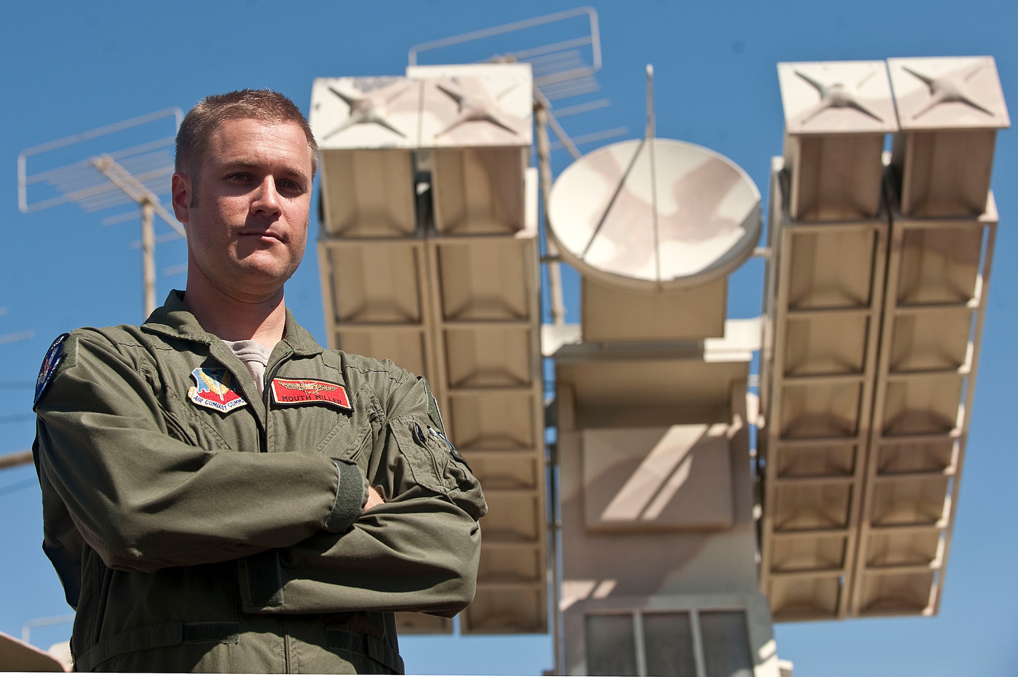 Capt. Jeffery Miller, 507th Air Defense Aggressor Squadron assistant director of operations, stands in front of an SA-9 Gasken, a mobile short-range surface-to-air missile Sept. 19, 2012, at Nellis Air Force Base Nev. Airmen of the 507th ADAS simulate a surface-to-air missile threat during Red Flag and Mission Employment exercises. (U.S. Air Force photo by Staff Sgt. Christopher Hubenthal)