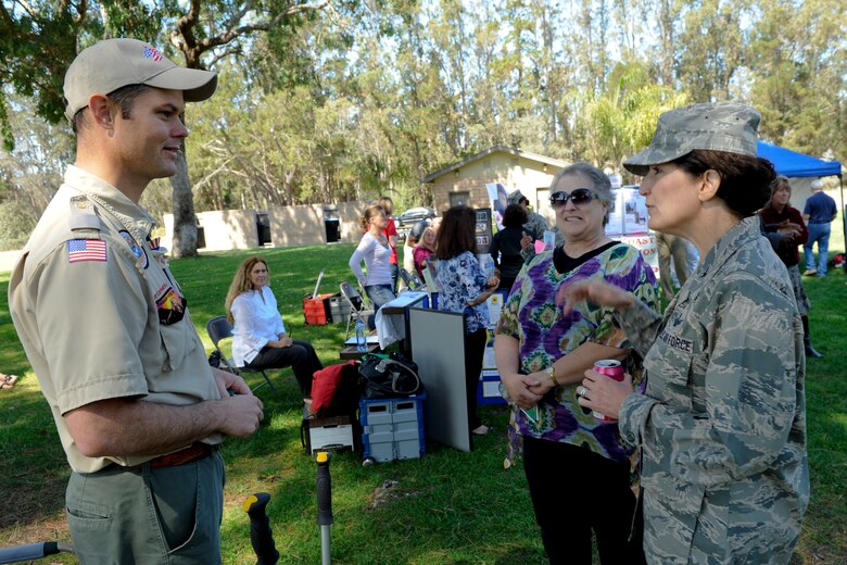 VANDENBERG AIR FORCE BASE, Calif. -- Col. Nina Armagno, 30th Space Wing commander, speaks with one of many Combined Federal Campaign organizational representatives during the CFC Barbecue at Cocheo Park here Thursday, Oct. 4, 2012. The barbeque signaled the start of this year's CFC with organizational displays, a rock climbing wall and a human foosball court. The CFC runs until Nov. 12 at Vandenberg and is open to all military and civilian DOD employees. interested contributors should contact their unit representative for more information or visit https://www.cfcnexus.org/_cfcgoldcoast to donate online until Dec 15. (U.S. Air Force photo/Staff Sgt. Levi Riendeau)