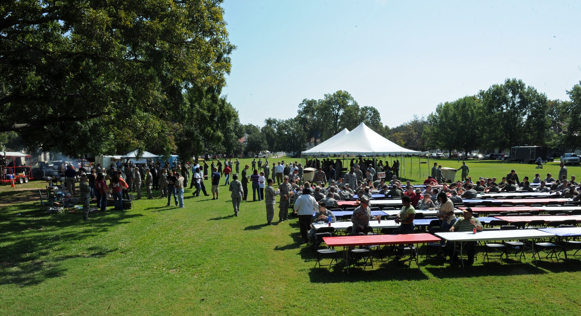 Members of Team Barksdale and the local community enjoy food and conversation during Celebrate Barksdale on Barksdale Air Force Base, La., Oct. 5. The 16th annual event, hosted by the Shreveport-Bossier Military Affairs council, gives the local community a chance to show their appreciation for the military. More than 800 participants attended the annual celebration. (U.S. Air Force photo/Airman 1st Class Benjamin Gonsier)(RELEASED)
