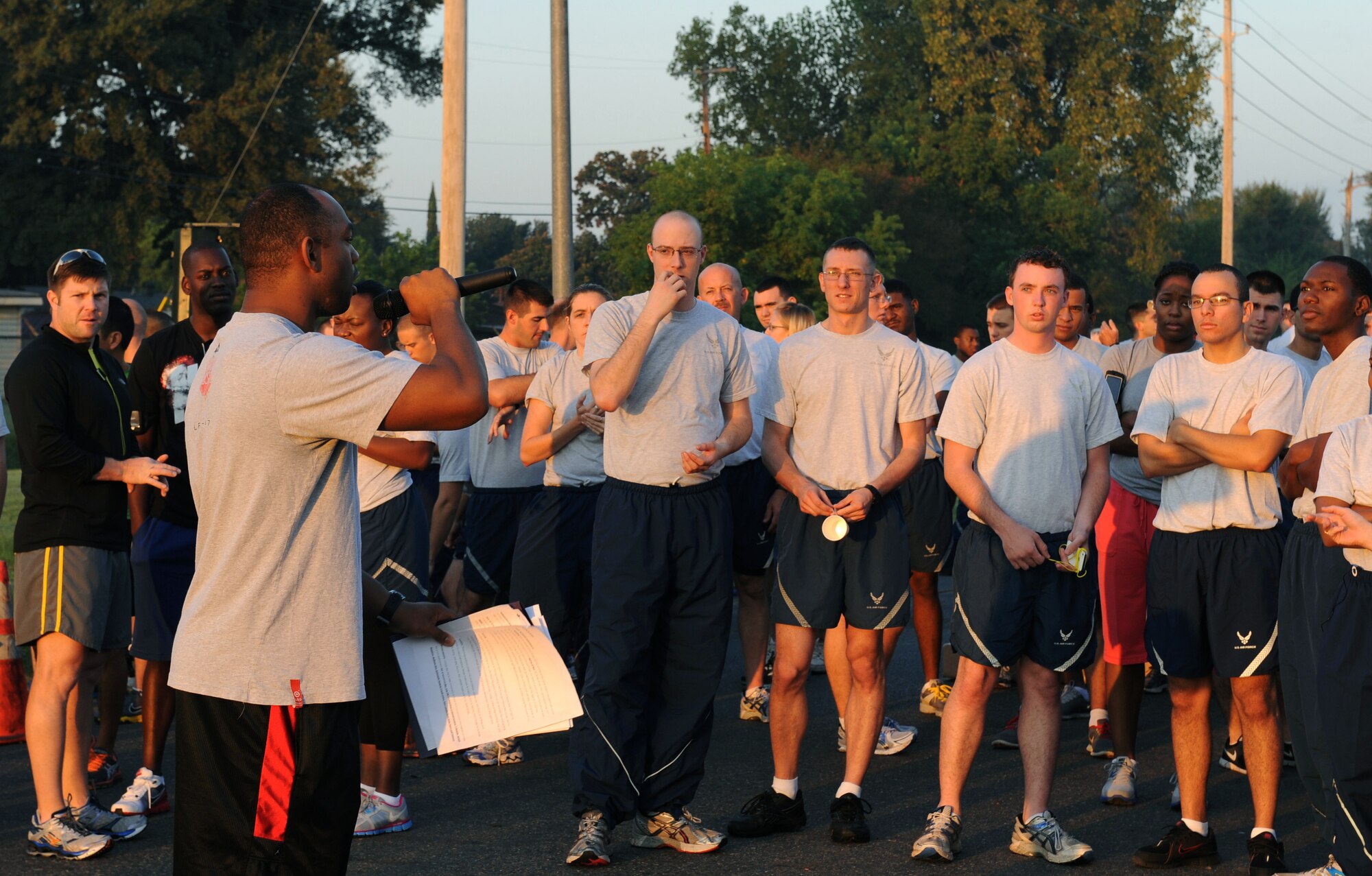Staff Sgt. Jerry Hicks, 2nd Force Support Squadron, speaks to members of Team Barksdale prior to the Celebrate Barksdale fun run on Barksdale Air Force Base, La., Oct. 5. The fun run kicked off a day of activities hosted by the Shreveport-Bossier Military Affairs Council, which included a picnic and other activities. (U.S. Air Force photo/Airman 1st Class Benjamin Gonsier)(RELEASED) 
