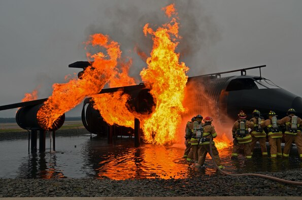 Westover's Fire Dept. trains with firefighters from the Chicopee Fire Dept. on procedures and technique when extinguishing aircraft fires. Westover's "Miss Piggy" simulates a variety of aircraft fires essential for firefighter training. (U.S. Air Force photo by SrA. Kelly Galloway)