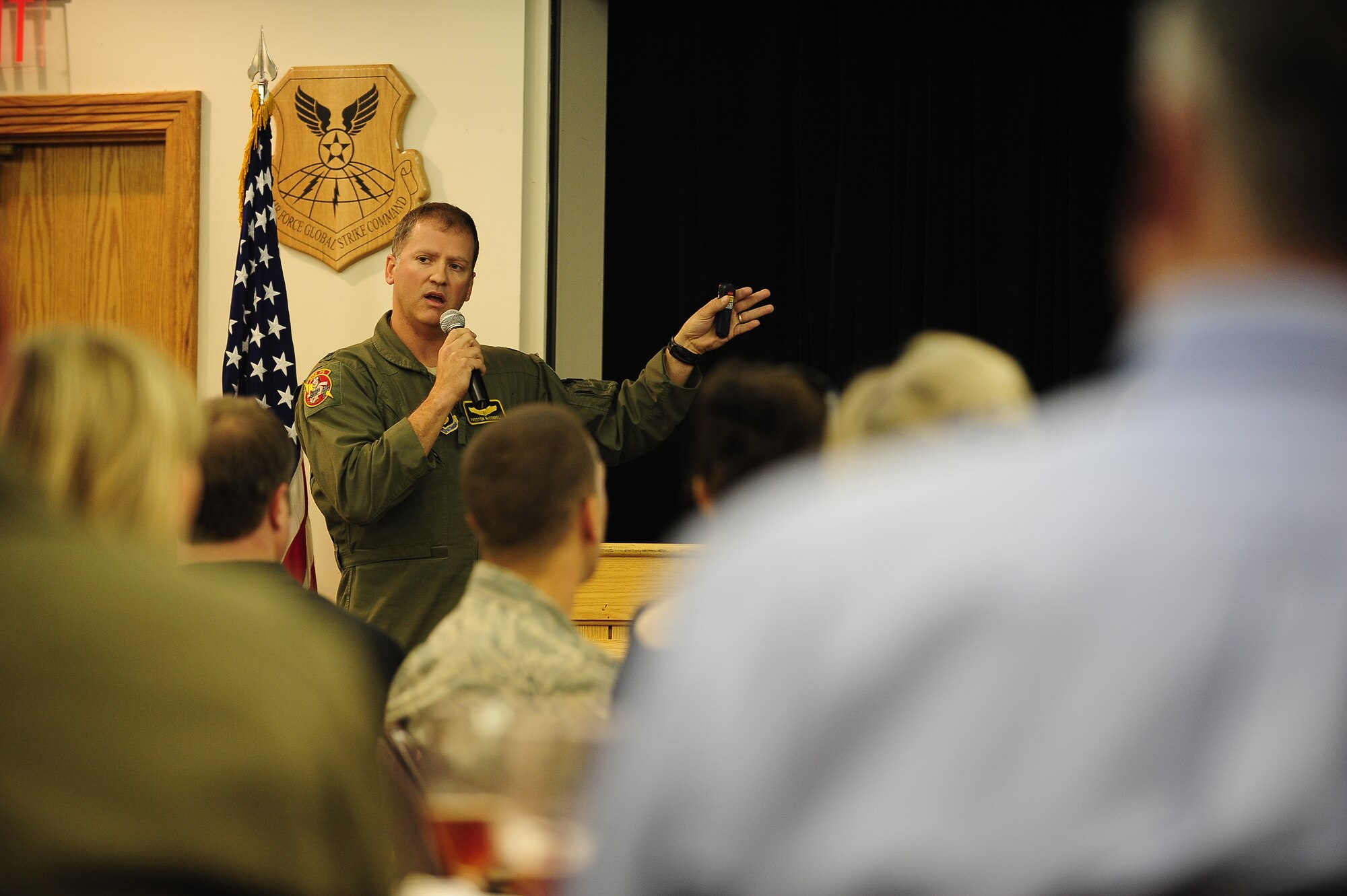 Lt. Col. Preston McConnell, 303rd Fighter Squadron director of operations and A-10 Thunderbolt II pilot, briefs Holden, Lincoln and Jefferson City, Mo., community members Oct. 4 at the Whiteman Base Community Council luncheon. McConnell spoke to the BCC about the wing's recent deployment to Afghanistan. The Base Community Council is comprised of non-military community leaders with the mission to support Airmen and bridge the gap between the base and the community. The 303rd FS is part of the 442nd Fighter Wing, an A-10 Thunderbolt II Air Force Reserve unit at Whiteman Air Force Base, Mo. (U.S. Air Force photo by Senior Airman Cody Ramirez/Released)
