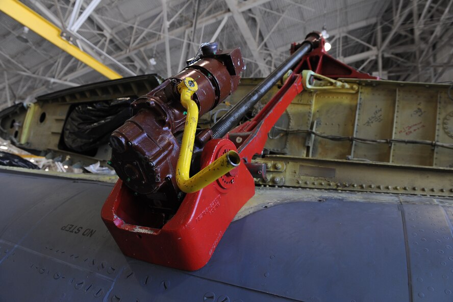 A jack screw helps hold a B-52H Stratofortress fin in place on Barksdale Air Force Base, La., Oct. 2. The jack screw is used to raise and lower the 2,600 pound fin by hand. For every 10 rotations the screw moves one thread. Raising or lowering the fin can take four to eight hours. (U.S. Air Force photo/Senior Airman Micaiah Anthony)(RELEASED)