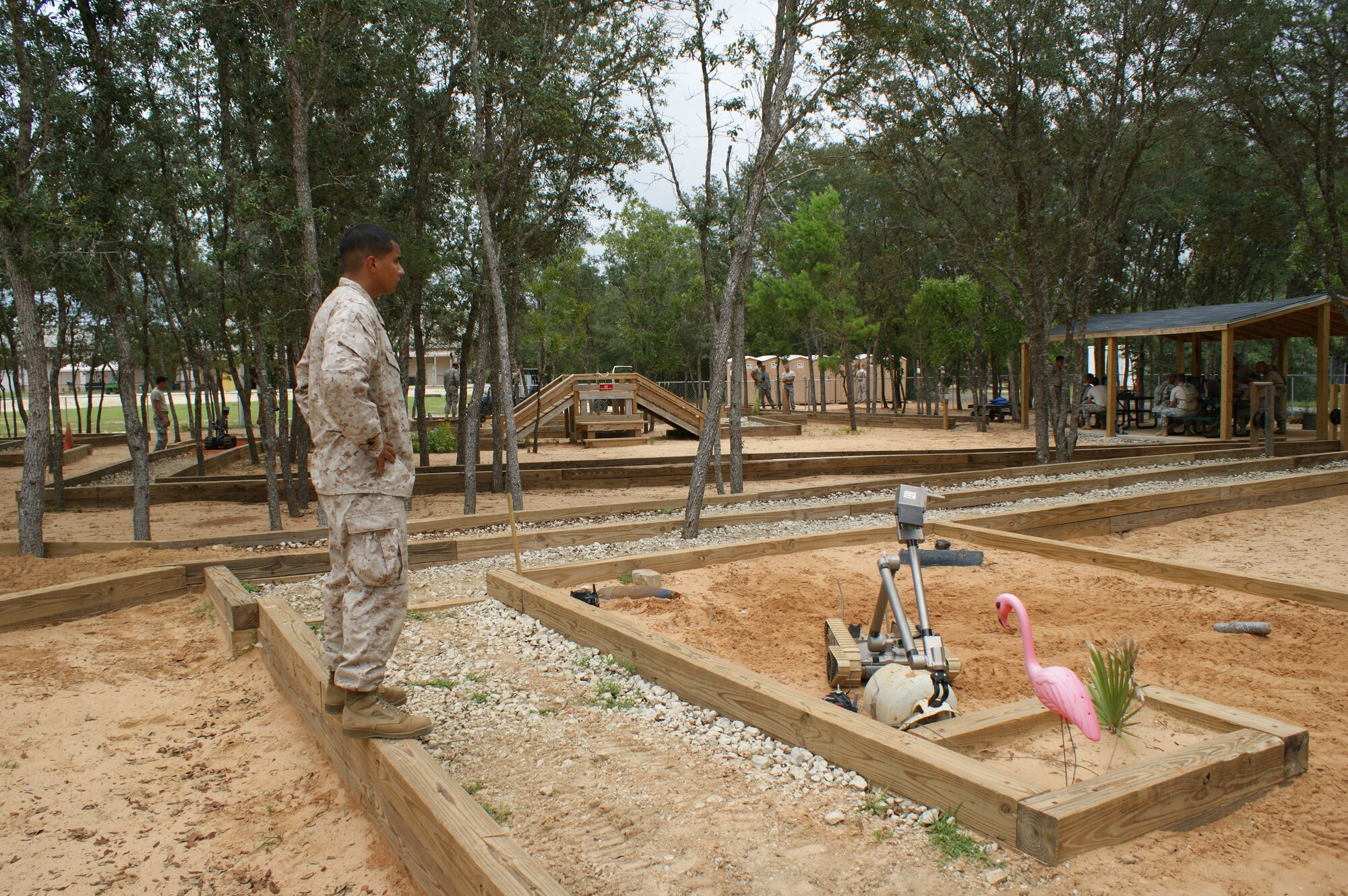 Naval School Explosive Ordnance Disposal students use the recently built robotics training area at Eglin Air Force Base, Fla., July 20, 2012.  The approximately $500,000 robotics course was built entirely by the NAVSCOLEOD staff using recycled materials. (U.S. Air Force photo/Dan Hawkins)