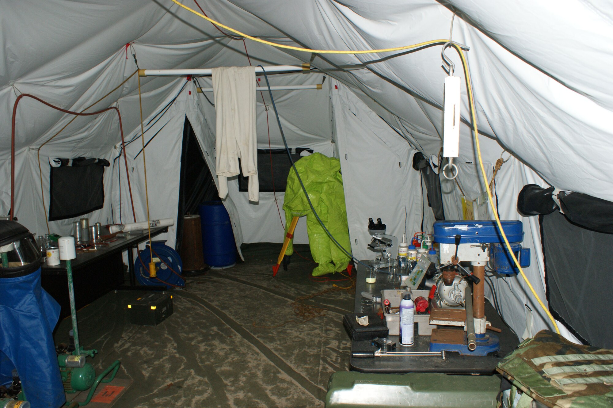 A look inside one of "terrorist" camp tents in one of the Weapons of Mass Destruction Division training areas at Naval School Explosive Ordnance Disposal at Eglin Air Force Base, Fla., July 20, 2012.  The "terrorist" camp was one of multiple projects completed by the NAVSCOLEOD staff utilizing recyclable materials from the Defense Reutilization and Marketing Service and other sources. (U.S. Air Force photo/Dan Hawkins)