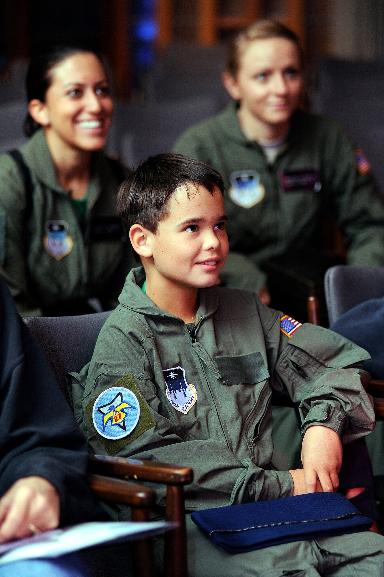 Wyatt Denton listens to a briefing during his visit to the Air Force Academy Sept. 28, 2012. Wyatt, a native of Parker, Colo., was made a cadet for a day through the Academy's partnership with the Make-a-Wish Foundation. (U.S. Air Force photo/Sarah Chambers)