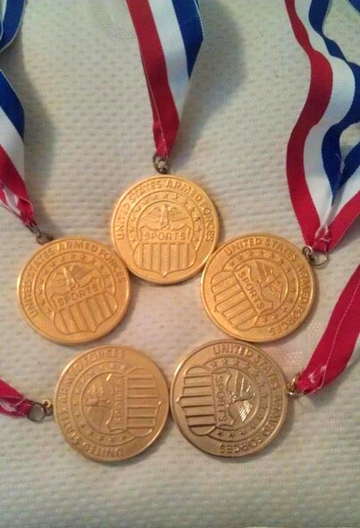 Master Sgt. Tony Patrick, 4th Equipment Maintenance Squadron NCO in charge of munitions inspections, has won five gold and three silver medals during his 10-year run on the Air Force men's softball team. The medals are awarded following the annual Armed Forces Softball Champsionships in September. (Courtesy Photo)