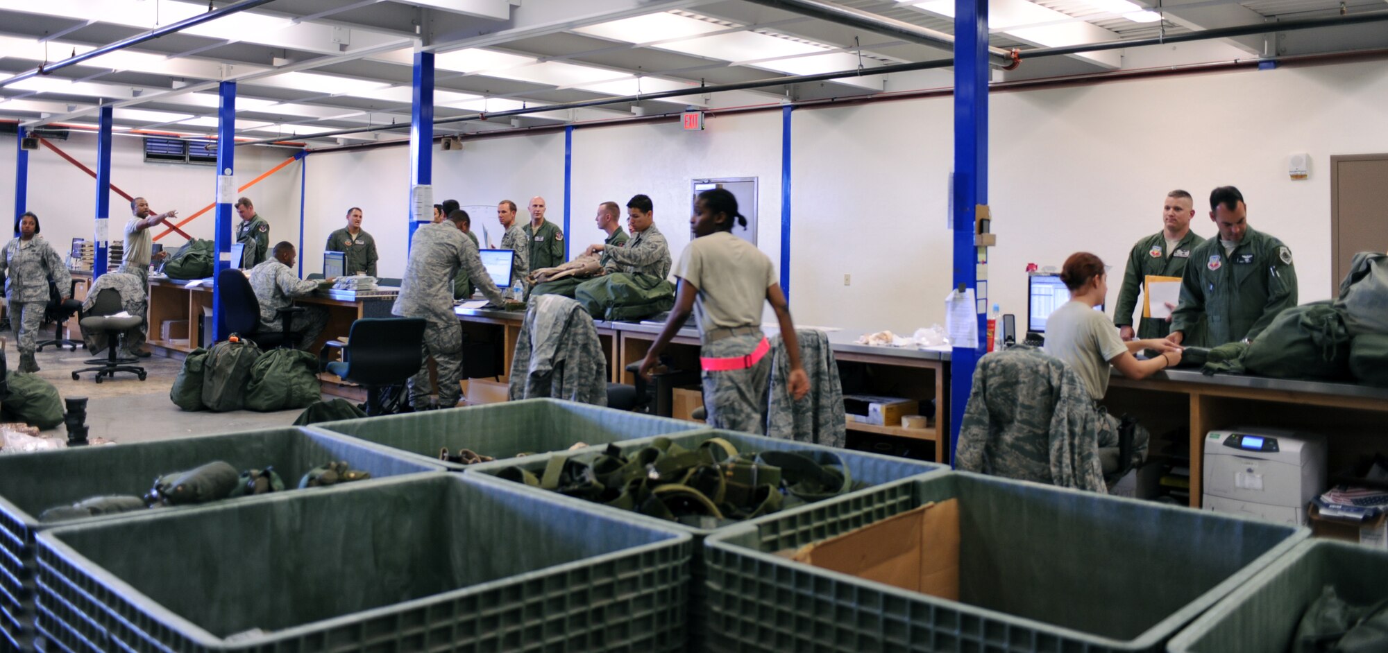 U.S. Air Force Airmen from the 55th Rescue Squadron, pick up equipment for their deployment at the 355th Logistic Readiness Squadron on Davis-Monthan Air Force Base, Ariz., Sept. 17, 2012. The 55th RQS deployed to Kandahar, Afghanistan. (U.S. Air Force photo by Airman 1st Class Christine Griffiths/Released) 