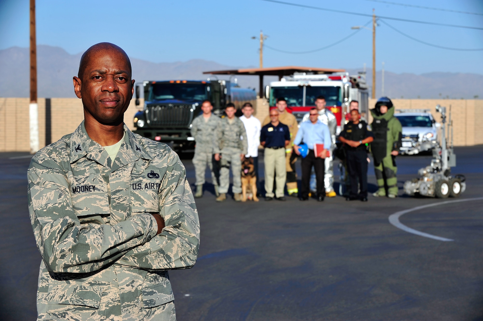 Colonel Nathan Mooney, 56th Mission Support Group commander, stands for a photo with members of the MSG at Luke Air Force Base, Ariz., Sept. 25, 2012. The MSG has the most versatile mission on Luke, ranging from personnel management to ensuring the aircraft are fueled.  (U.S. Air Force photo by Staff Sgt. Jason Colbert)