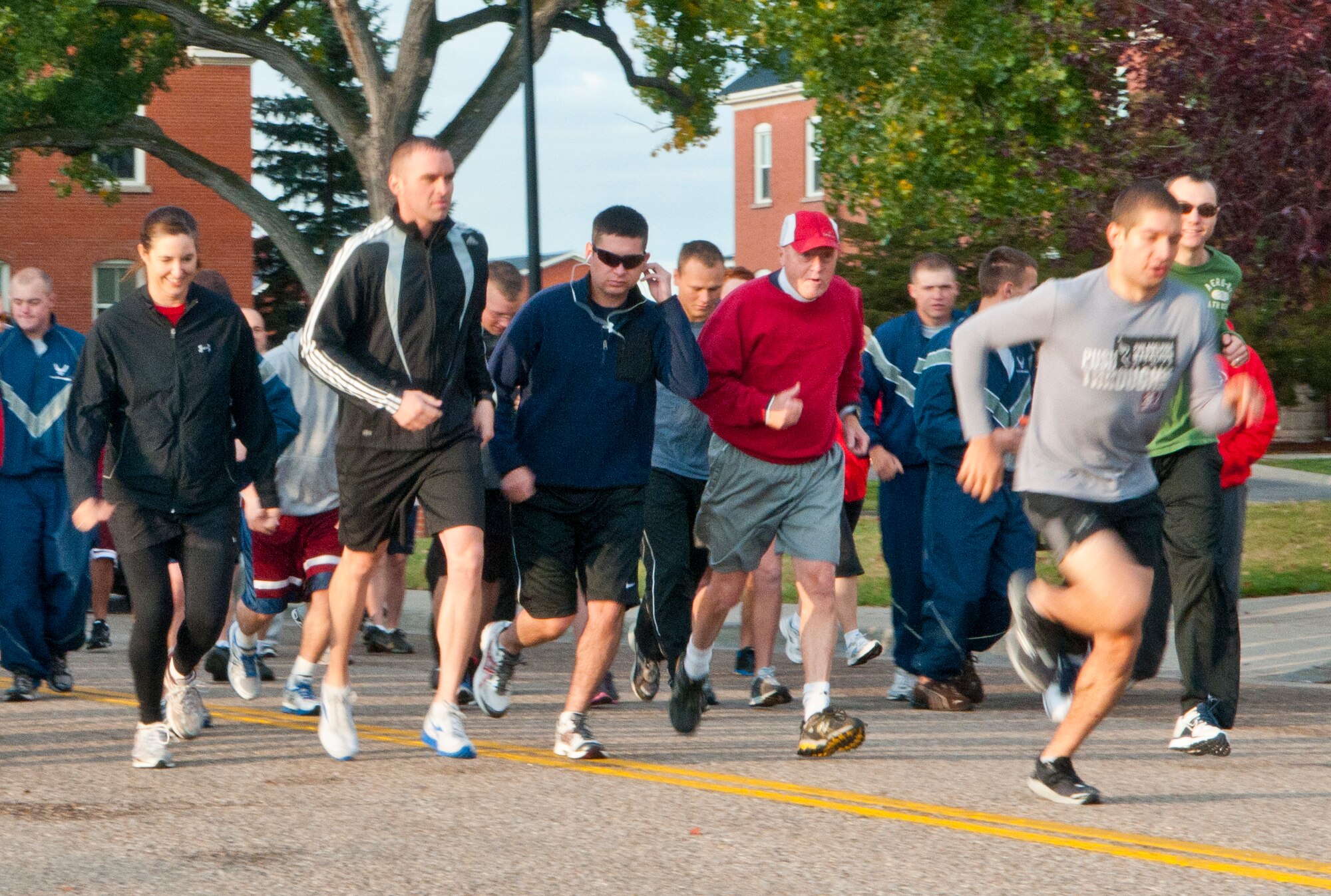 Warren personnel begin the Combined Federal Campaign kickoff 5K run and 1.5-mile walk outside the F. E. Warren Base Theater Sept. 28. After the kickoff, participants ate breakfast in the Fall Hall Community Center. (U.S. Air Force photo by Airman 1st Class Jason Wiese)