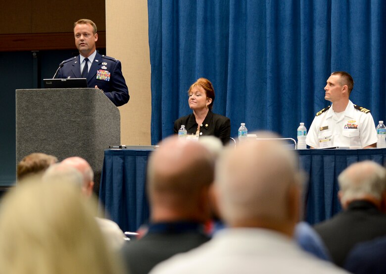 Col. James Hodges, 6th Mission Support Group commander at MacDill Air Force Base, speaks in downtown Tampa, Fla., about Air Force energy conservation initiatives, Oct. 5, 2012. Representatives from the Air Force, Army and Navy along with Department of Defense civilian engineers meet to discuss future goals for renewable energy sources, the event had more than 600 individuals participate. (U.S. Air Force photo by Senior Airman Adam Grant) (Released)