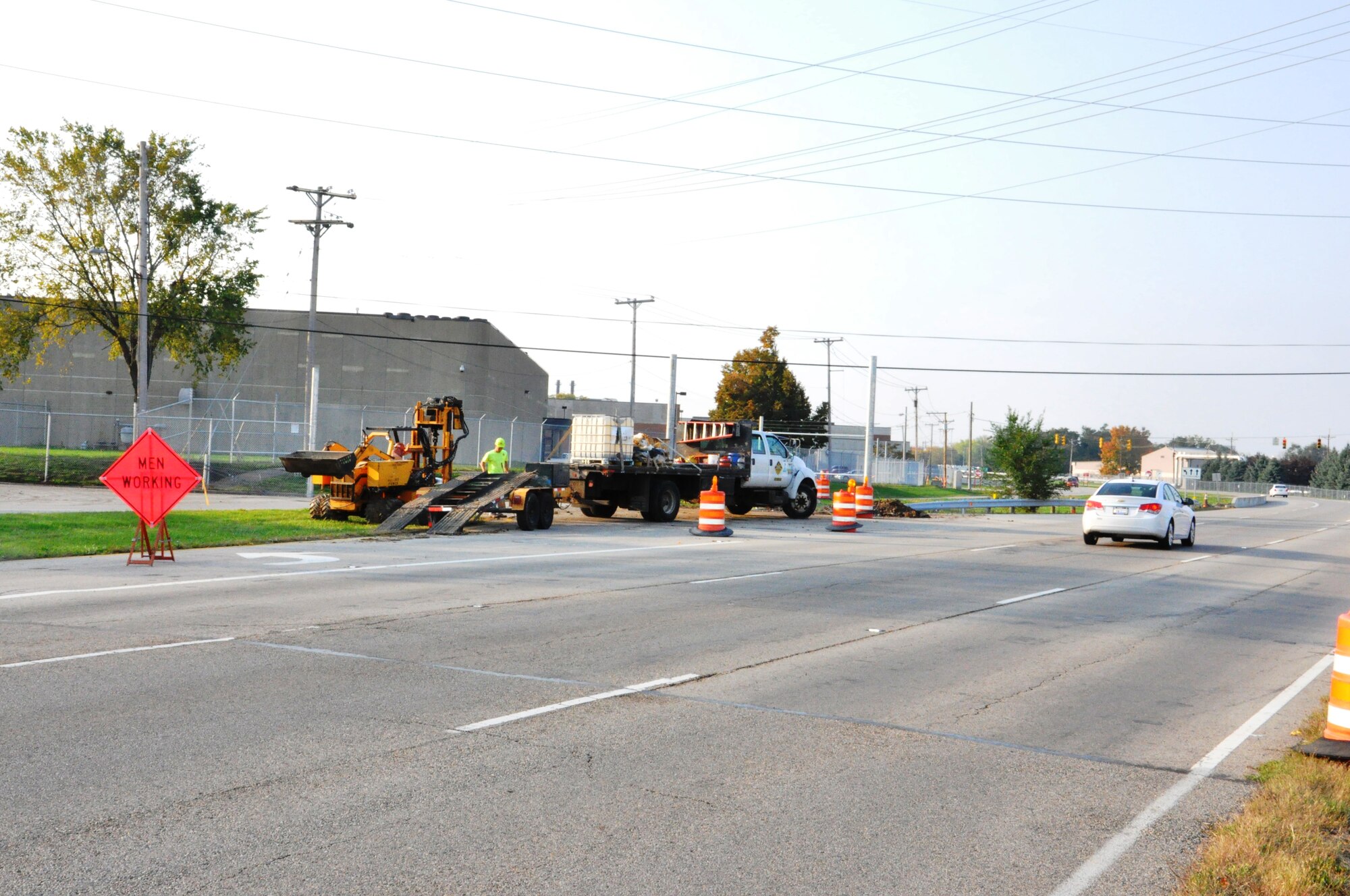 Work continues on the new Gate 1A that will close off State Route 444 adjacent to the Wright-Patterson Commissary.  The barriers closing the road are scheduled to go up at 9 a.m. on Tuesday, Oct. 9.  After that time, both Gates 12A and the current 1A will be open 24 hours a day, seven days a week.  Signs will be set up to direct trafffic from those gates to the Kittyhawk Area.  (photo by Ted Theopolos)