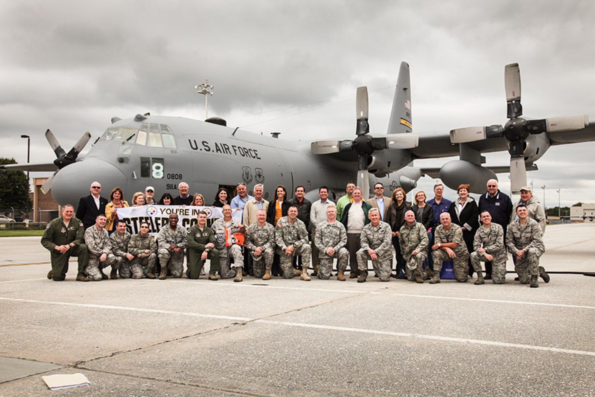The Greater Pittsburgh Civic Leaders pose for a group photo shortly after arriving at Dobbins Air Reserve Base in the C-130H from the 911th Airlift Wing at Pittsburgh IAP Air Reserve Station on Oct. 2. The members of the Pittsburgh Civic Leaders came to Dobbins to better familiarize themselves with different aspects of the military. (U.S. Air Force photo by Tech. Sgt. Ralph Van Houtem/Released)