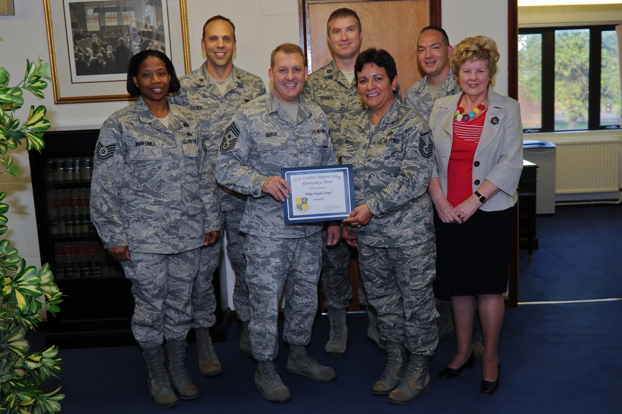 RAF ALCONBURY, United Kingdom – Master Sgt. Angela Angel, 501st Combat Support Wing Legal Office superintendent, was named the September 501st CSW Everyday Hero from the 501st CSW wing staff. Angel volunteered to fill in at critical time as the law office superintendent recently deployed and inspection preparation was starting to ramp up. Over the past month, she updated and created multiple continuity books, improved answers to inspection questions, and located supporting documentation for those answers. Eager to share her considerable experience, Angel also identified multiple areas to improve processes within the legal office, including the handling of claims and legal assistance while reinvigorating paralegal training. (U.S. Air Force photo by Staff Sgt. Brian Stives)