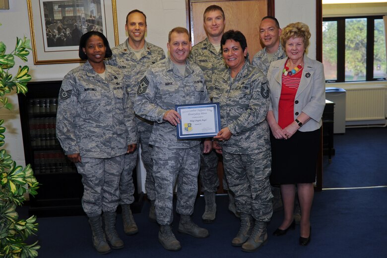 RAF ALCONBURY, United Kingdom – Master Sgt. Angela Angel, 501st Combat Support Wing Legal Office superintendent, was named the September 501st CSW Everyday Hero from the 501st CSW wing staff. Angel volunteered to fill in at critical time as the law office superintendent recently deployed and inspection preparation was starting to ramp up. Over the past month, she updated and created multiple continuity books, improved answers to inspection questions, and located supporting documentation for those answers. Eager to share her considerable experience, Angel also identified multiple areas to improve processes within the legal office, including the handling of claims and legal assistance while reinvigorating paralegal training. (U.S. Air Force photo by Staff Sgt. Brian Stives)