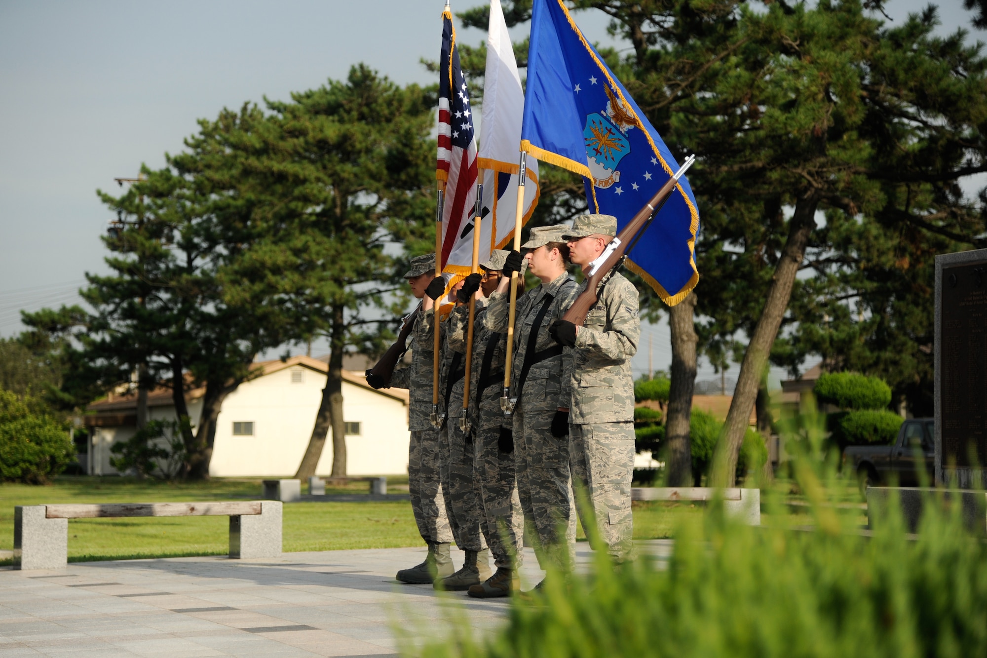 The Kunsan Air Base Honor Guard honors prisoners of war and those missing in action during a ceremony Sept. 21, 2012, at Kunsan AB, Republic of Korea. The 2012 national theme of "'Until They Are Home,” pays special tribute to the families of servicemembers who have sacrificed and endured on behalf of their loved ones. (U.S. Air Force photo/Tech. Sgt. Michael Schocker)