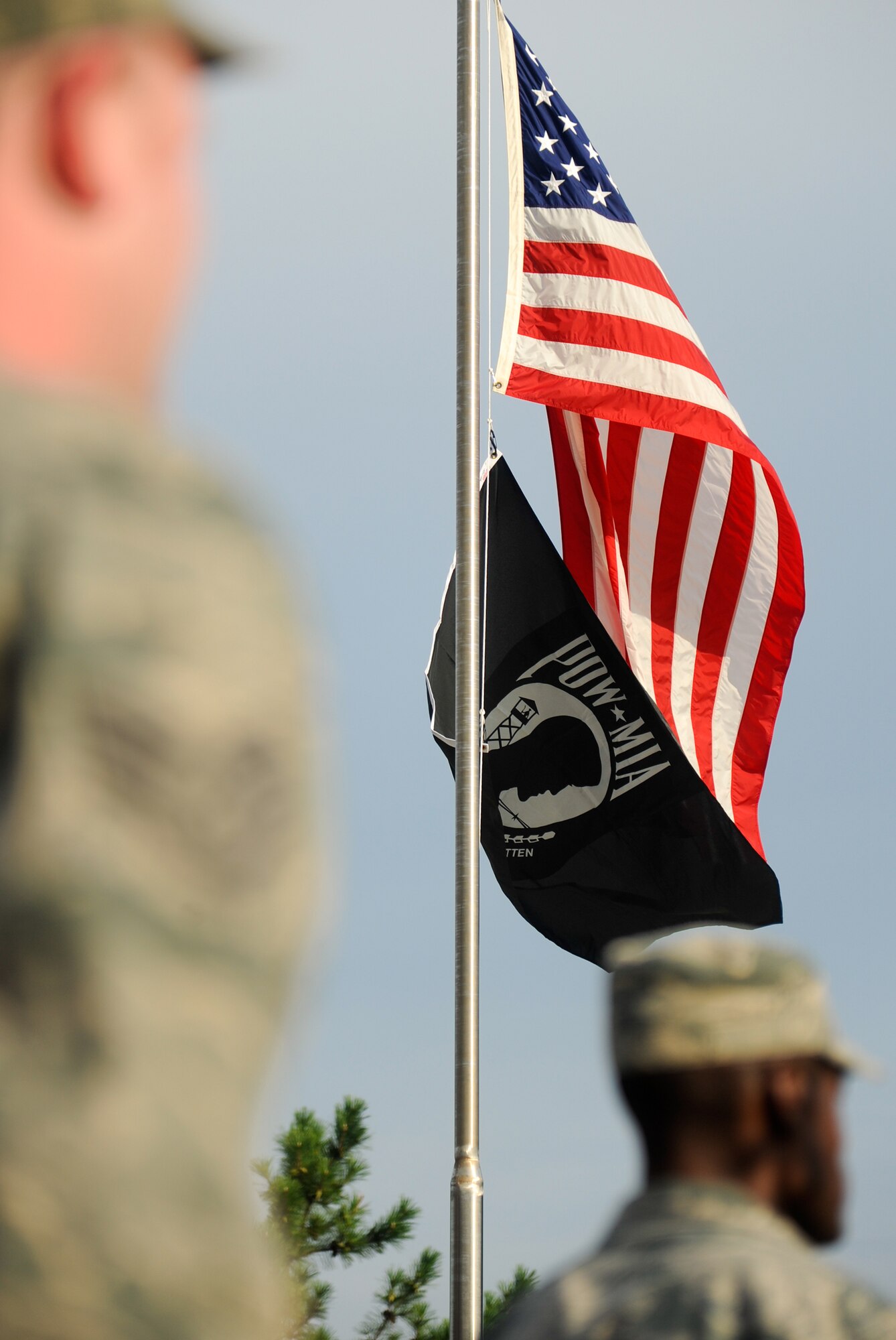 The prisoners of war and missing in action flag is lowered during a retreat ceremony Sept. 21, 2012, at Kunsan Air Base, Republic of Korea. During the Korean War from 1950 to 1953, nearly 8,000 servicemembers were listed as a POW or MIA. (U.S. Air Force photo/Tech. Sgt. Michael Schocker)