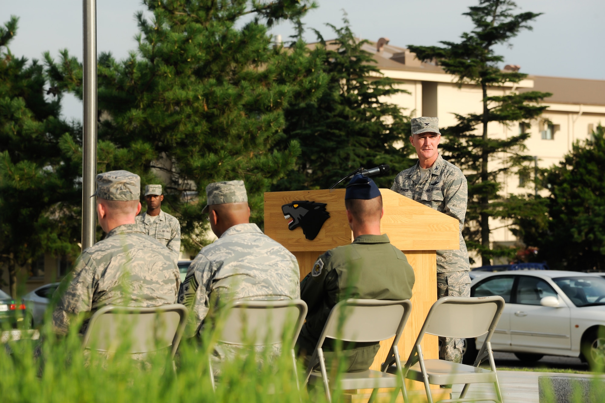 Col. John Pearse, 8th Fighter Wing commander, addresses Wolf Pack Airmen during a retreat ceremony Sept. 21, 2012, at Kunsan Air Base, Republic of Korea. The ceremony honored the more than 80,000 servicemembers who are prisoners of war or missing in action. (U.S. Air Force photo/Tech. Sgt. Michael Schocker)