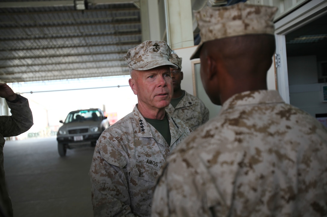 U.S. Marine Corps Commandant Gen. James F. Amos meets with Personnel Retrieval and Processing Company (PRP), 2d Marine Logistics Group Forward (2d MLG Fwd), on Camp Bastion, Helmand Province, Afghanistan, September 23, 2011. The Commandant and Sergeant Major of the Marine Corps visit with PRP to commend their work during Operation Enduring Freedom, supporting International Security Assistance Force (ISAF) operations. (U.S. Marine Corps photo by Cpl. Michael Augusto/Released)