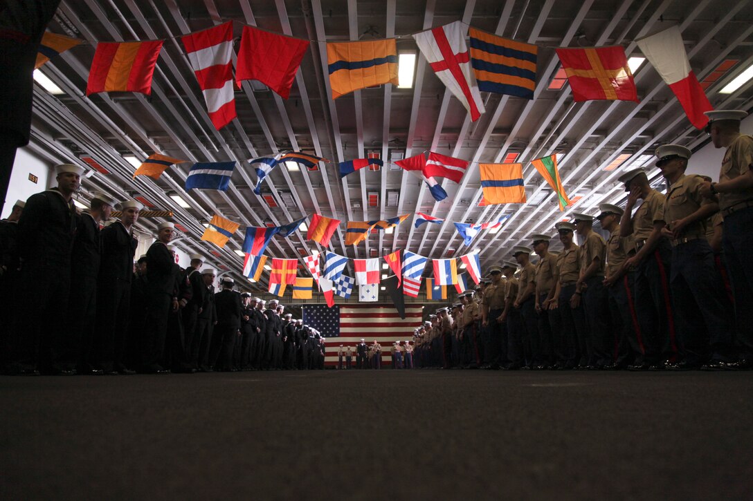 20121003-M-IO267-047
SAN FRANCISCO - U.S. Marines and Sailors with the 13th Marine Expeditionary Unit man the rails aboard the USS Makin Island (LHD-8) prior to landing in San Francisco, for the 2012 Fleet Week, Oct 3, 2012. From Oct. 3-8, Marines and Sailors of the 13th Marine Expeditionary Force, I Marine Expeditionary Brigade, will participate in numerous community outreach events including the Italian Heritage Day parade, urban search and rescue demonstration, park restoration projects and hospital visits. 
 (U.S. Marine Corps photo by Lance Cpl. David Gonzalez/Released)
