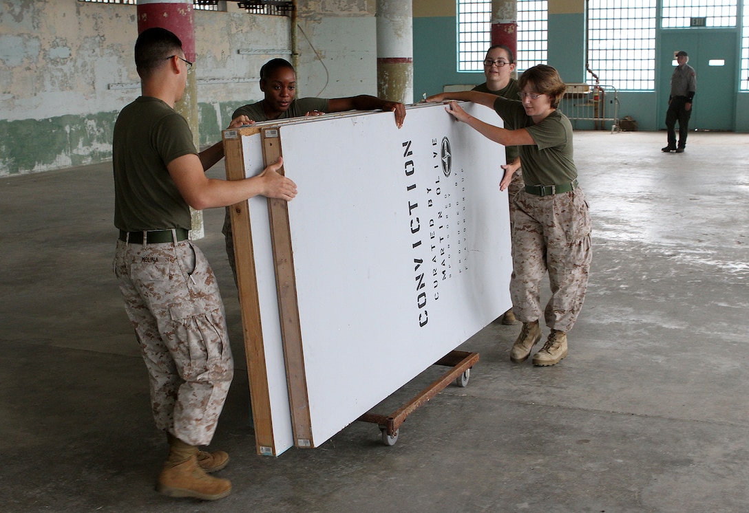 Marines with the 13th Marine Expeditionary Unit move wooden pallets to clean Alcatraz Island during San Francisco Fleet Week Oct. 4, 2012. Fleet Week is dedicated to showcase the United States military's capability of humanitarian assistance and disaster-response preparedness on the homefront.