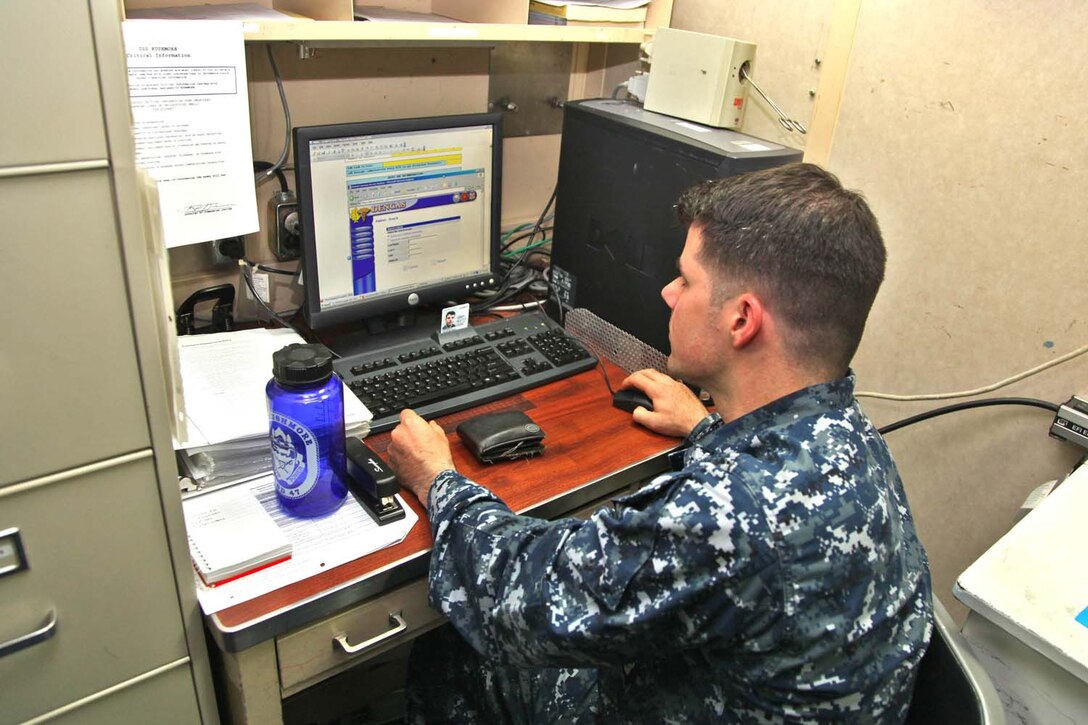 Petty Officer 2nd Class Jason M. Griswold, corpsman, Ship’s Company, USS Rushmore, updates patients records on board the USS Rushmore, Oct. 3. Although it’s much smaller than the Peleliu Amphibious Ready Group’s flag ship, the USS Peleliu, the medical and dental departments aboard the Rushmore are capable of preventing and treating illnesses and minor injuries, cleaning teeth and removing cavities, training and educating Marines and sailors and preparing for the rapid treatment of combat casualties. Griswold, 25, is from Gray, Ga.

