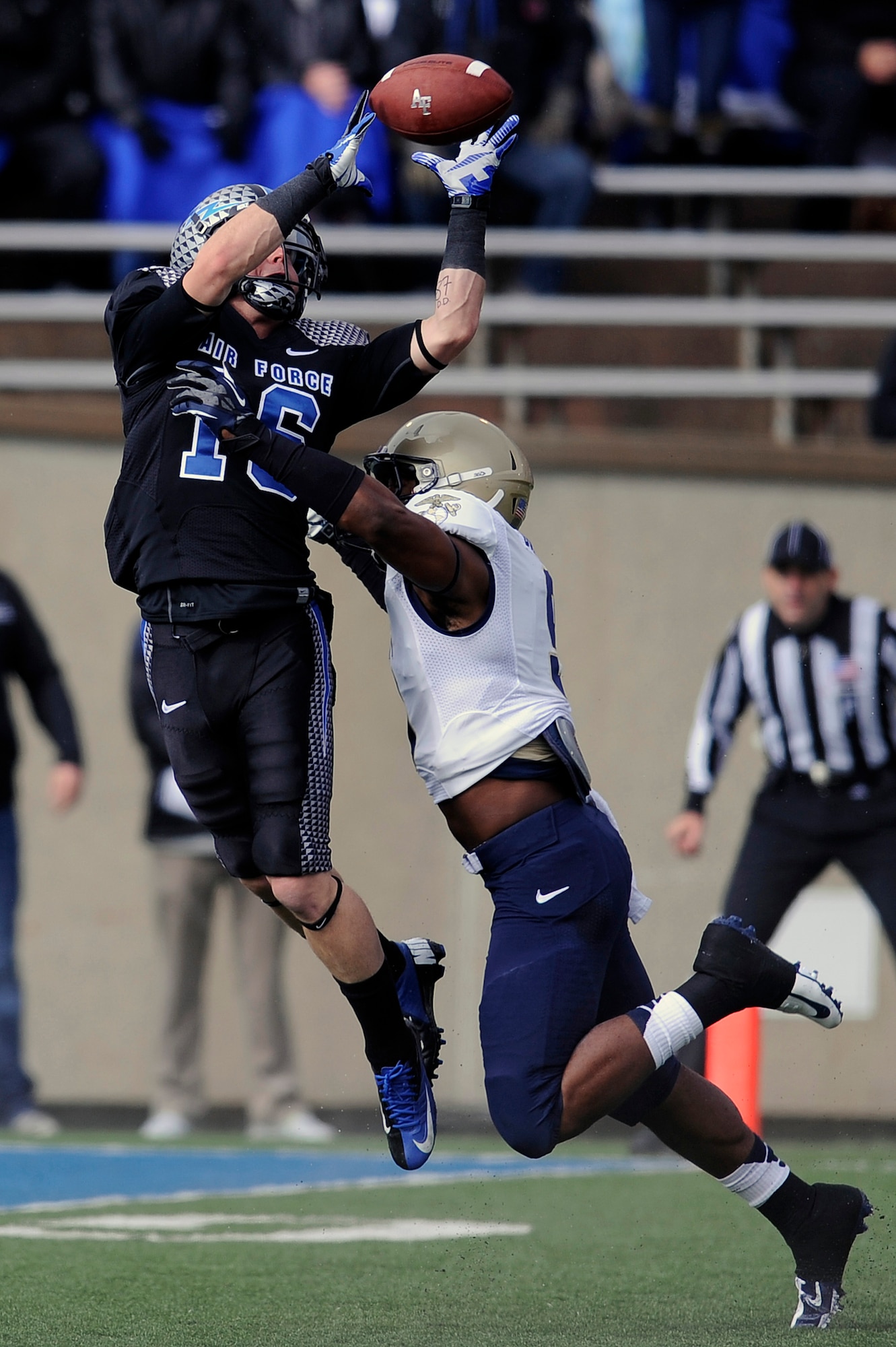 Air Force wide receiver Drew Coleman pulls down a 35-yard pass for a touchdown in the Navy-Air Force game at Falcon Stadium Oct. 6, 2012. Coleman had four catches for 104 yards and two touchdowns in Air Force's 28-21 overtime loss to the Midshipmen. (U.S. Air Force photo/Mike Kaplan)