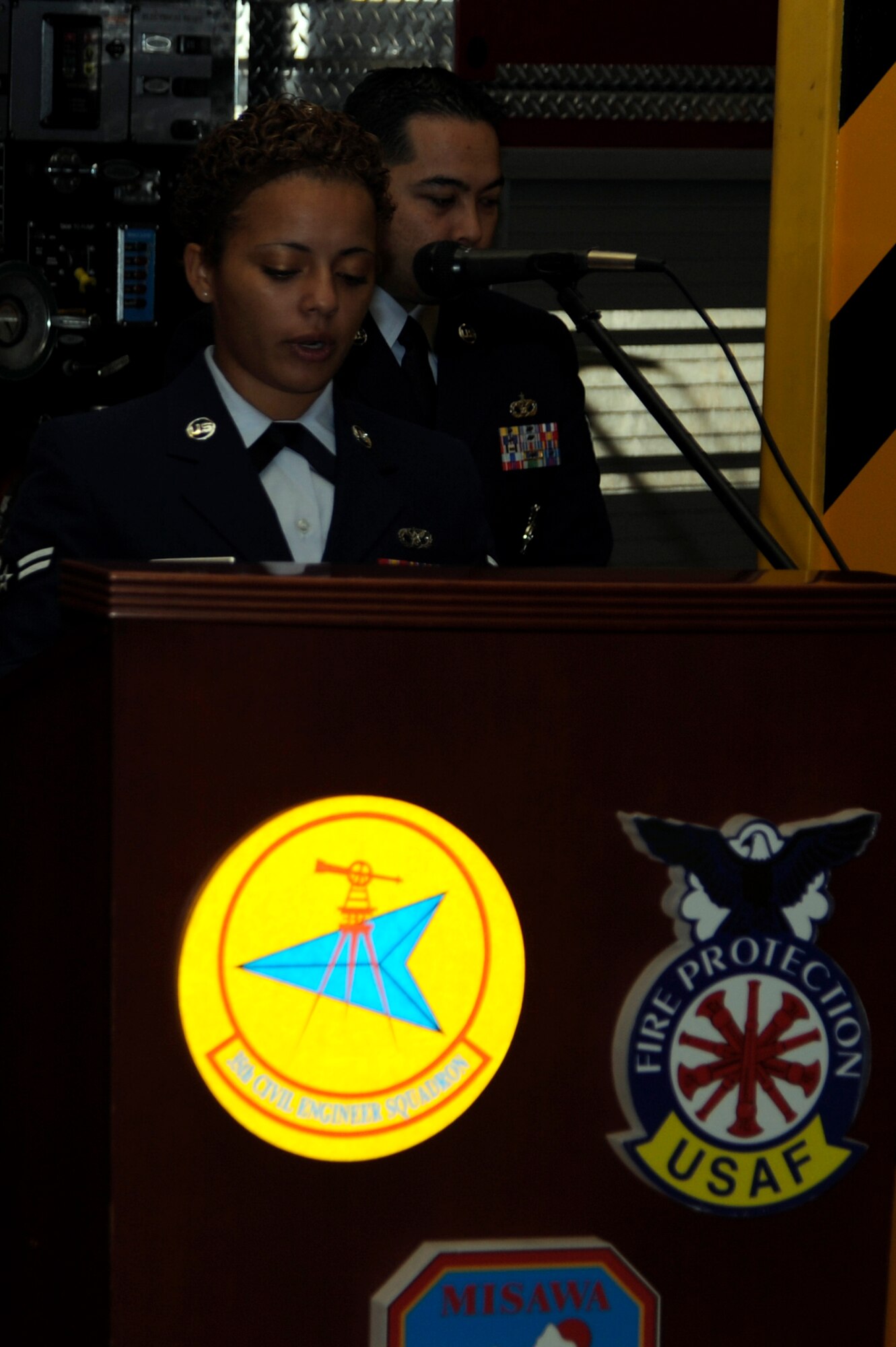 U.S.U.S. Air Force Airman 1st Class Hillary Rodriguez, 35th Civil Engineer Squadron firefighter, reads the Firefighter Prayer during the Bells Across America Memorial Service, part of the National Fallen Firefighter Memorial Weekend, at Misawa Air Base, Japan, Oct. 7, 2012. Fire departments across the Department of Defense are all holding a ceremony to honor all the firefighters who have made the ultimate sacrifice. (U.S. Air Force photo/Tech. Sgt. Marie Brown)