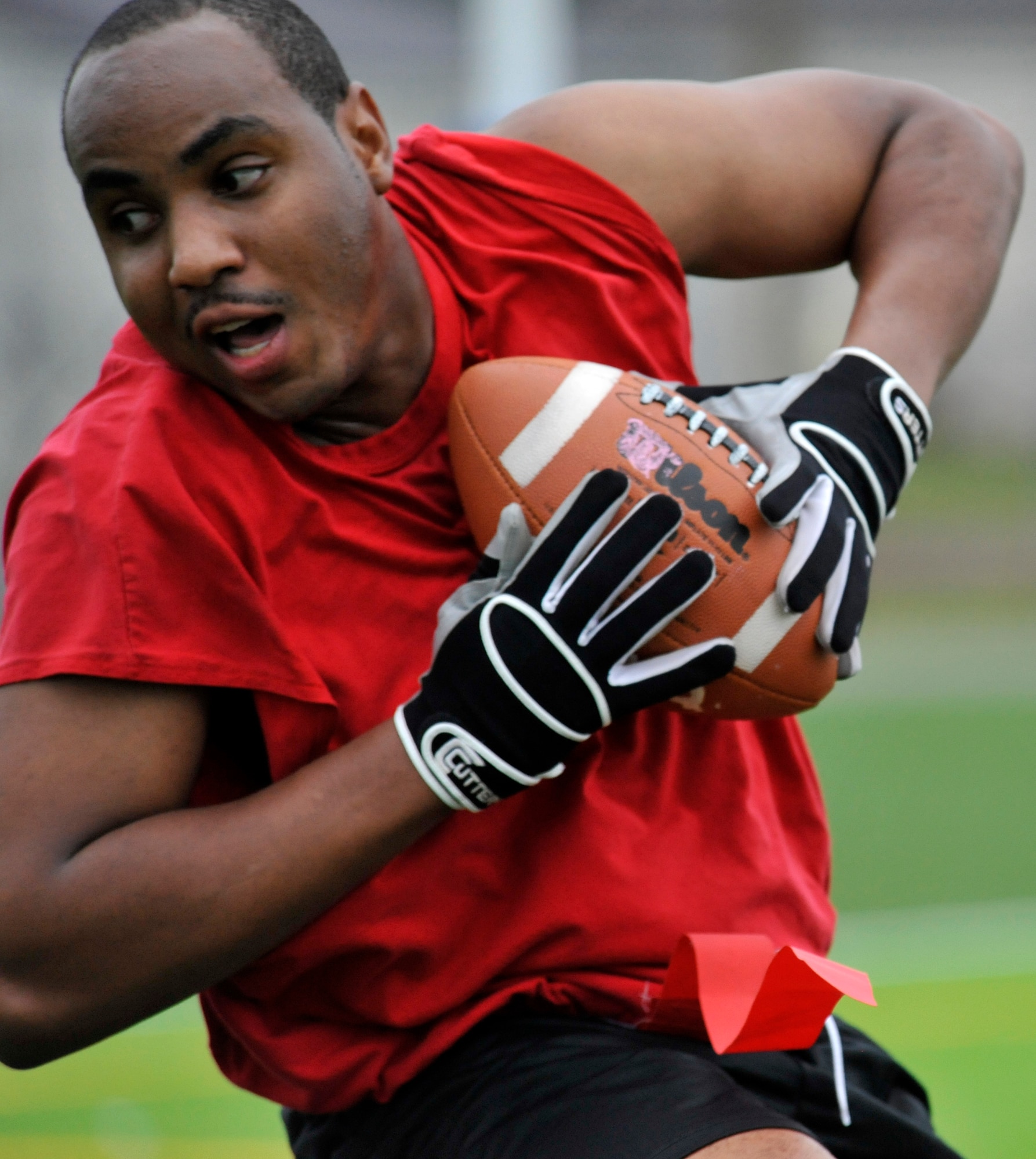 Taurean Savage, 35th Medical Group flag football team member, falls into the end zone after making a catch during his team’s first game of the season at Misawa Air Base, Japan, Oct. 6, 2012. The intramural flag football season is scheduled to go on for nine weeks, with playoffs starting Dec. 1, 2012 and the top 6 teams making the playoffs. (U.S. Air Force photo by Airman 1st Class Zachary Kee)