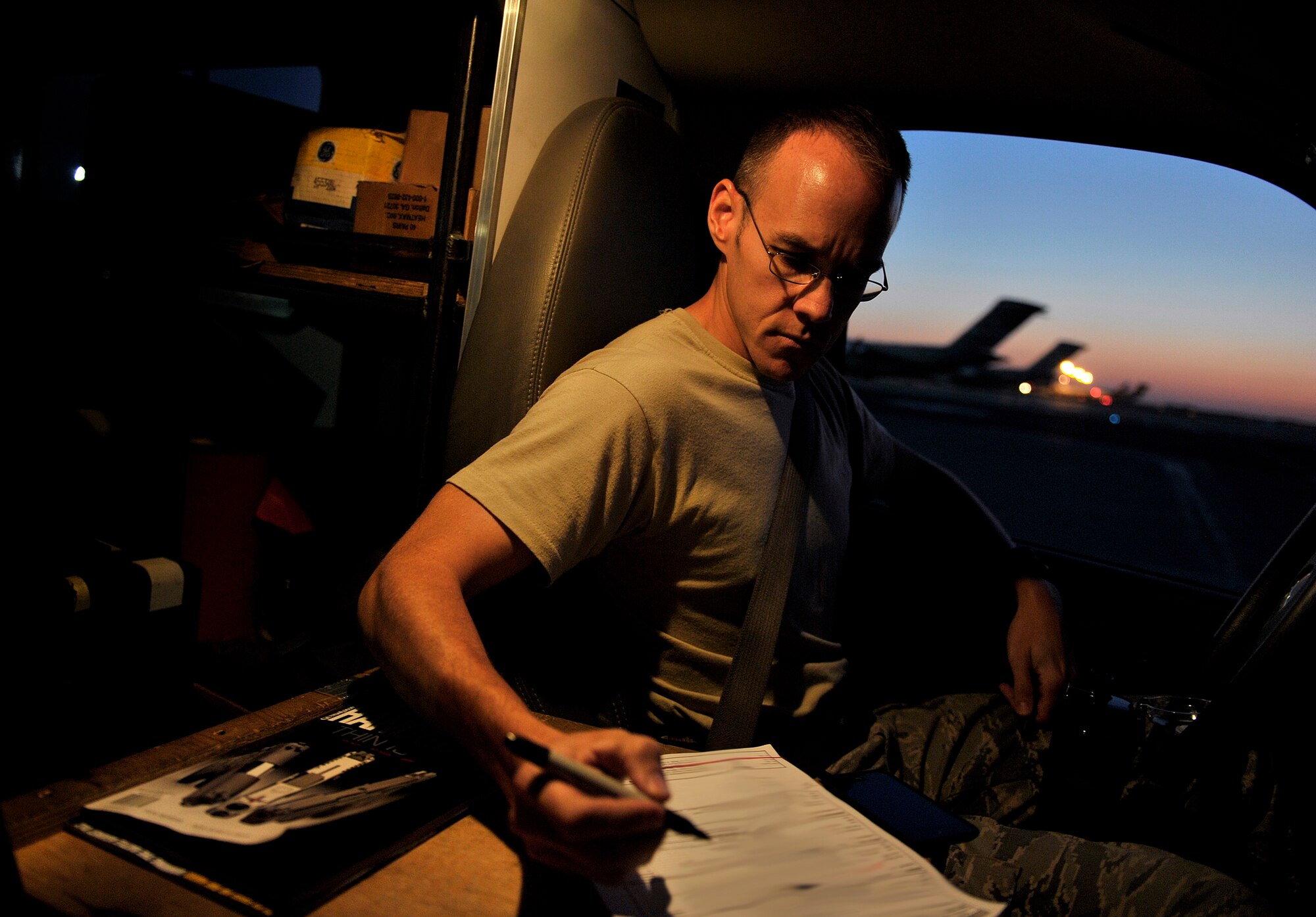 U.S. Air Force Tech. Sgt. Dallas Powers, 728th Air Mobility Squadron ,Operation Location-Alpha expediter, checks on the arrival of a C-17 Globemaster III, Transit Center at Manas, Kyrgyzstan, Sept. 15, 2012. Powers and his crew of maintainers are an important piece of keeping the C-17, with its expansive airlift and transport capabilities, operational in the AOR. The U.S. military is drawing down forces in Afghanistan and are redeploying combat forces while transitioning security control to the Afghan National Security Forces (ANSF). The ANSF and U.S. forces have worked closely and effectively to transition control of security in Afghanistan. (U.S. Air Force photo/Staff Sgt. Clay Lancaster)