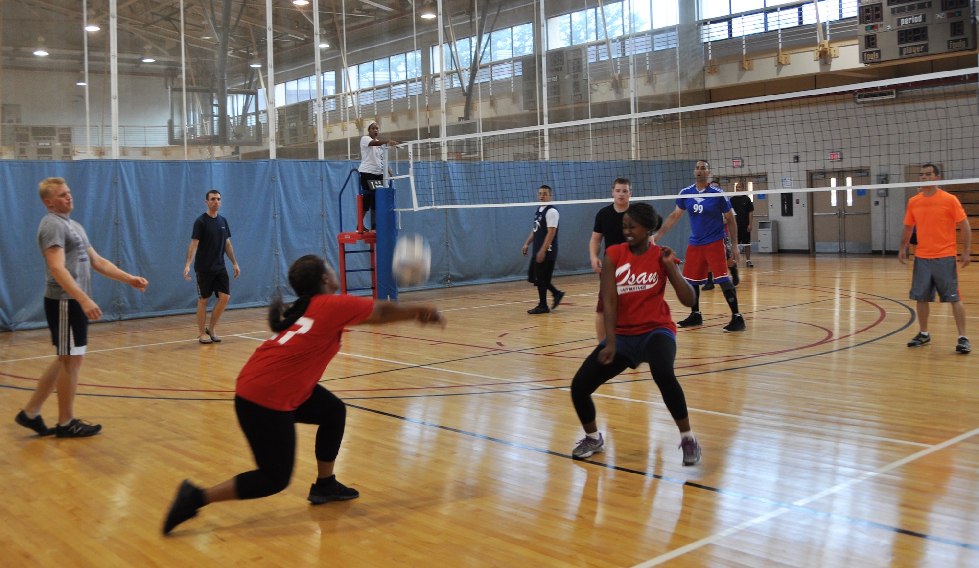 Service members from Osan Air Base and U.S. Army Garrison Yongsan participate in a volleyball tournament during the 2012 Sports Day event at Osan’s fitness center, Sept. 28, 2012. The event was hosted by the Osan Junior Enlisted and the Air Force Sergeants Association, and involved more than 250 participants and volunteers. (U.S. Air Force photo/Staff Sgt. Stefanie Torres) 