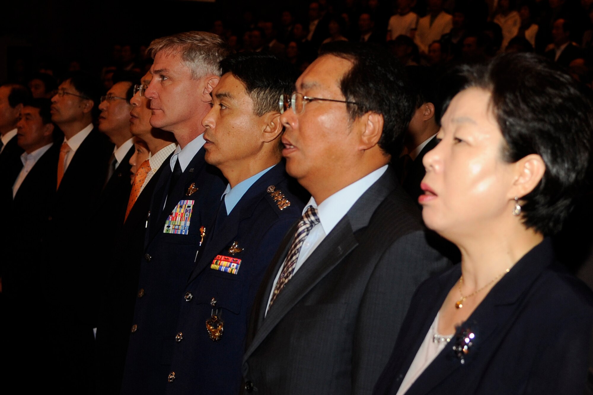 Col. John Pearse, U.S. Air Force 8th Fighter Wing commander, left, and Republic of Korea Air Force Col. Eun-Sung Baek, 38th Fighter Group commander, attend the Gunsan City Citizens Appreciation Day at Gunsan City, Republic of Korea, Oct. 5, 2012. Both militaries are very appreciative of the civilians who work hand in hand with them in the pursuit of a better tomorrow. (U.S. Air Force photo/Senior Airman Marcus Morris)