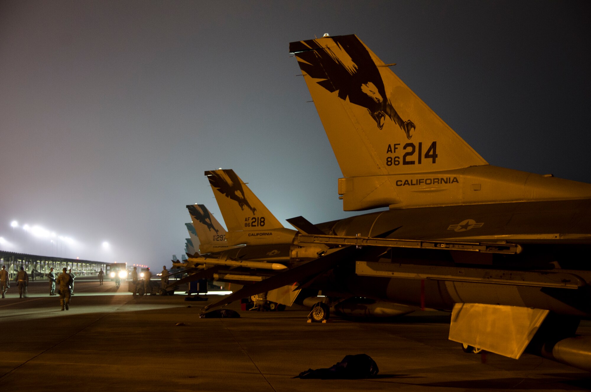 Airmen from the 144th Fighter Wing prep F-16C Fighting Falcon's for an early morning training mission during Combat Archer, a weapon systems academics exercise, at Tyndall AFB, Florida, October 9, 2012.