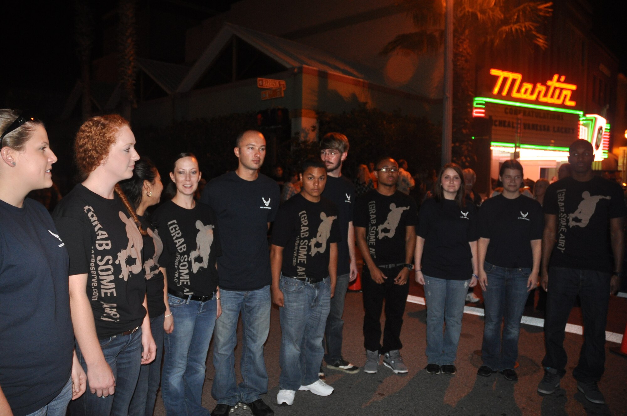 Twelve Panhandle residents took the oath of enlistment surrounded by their families and friends in front of the Martin Theater in downtown Panama City Friday. (U.S. Air Force photo by 2nd Lt. Andrea Valencia)