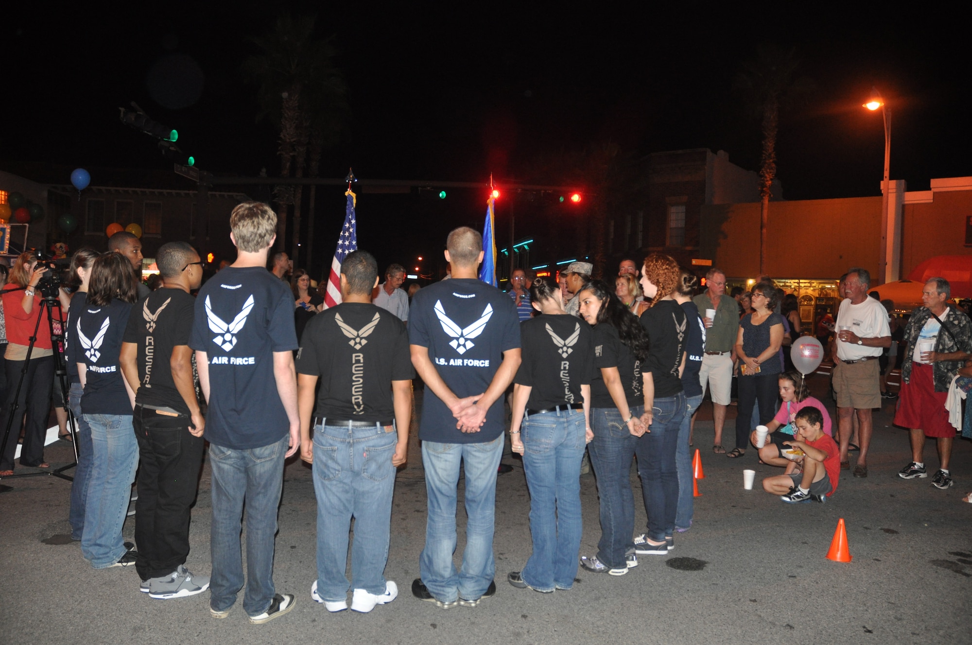 Twelve Panhandle residents took the oath of enlistment surrounded by their families and friends in front of the Martin Theater in downtown Panama City Friday. (U.S. Air Force photo by 2nd Lt. Andrea Valencia)