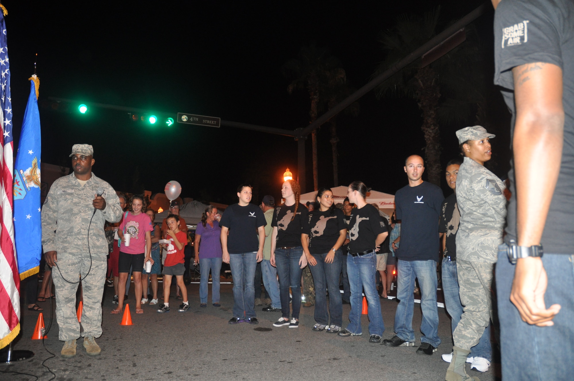 Twelve Panhandle residents took the oath of enlistment surrounded by their families and friends in front of the Martin Theater in downtown Panama City Friday. (U.S. Air Force photo by 2nd Lt. Andrea Valencia)